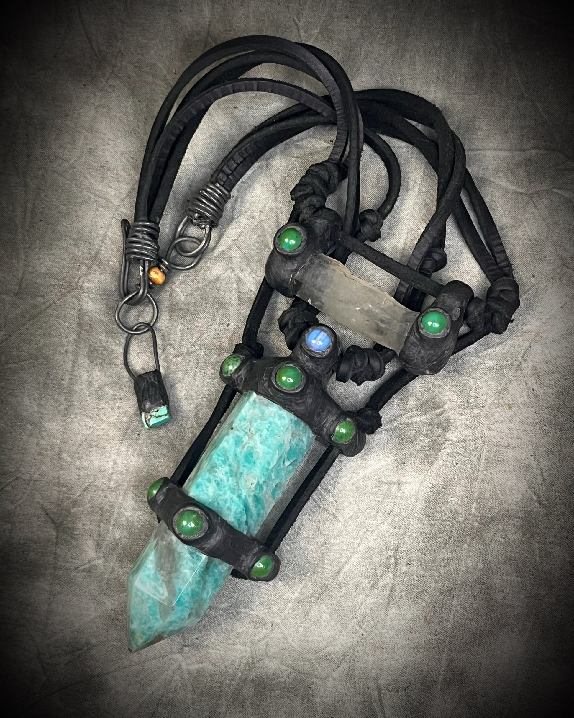 Handmade leather crystal necklace with XL amazonite point, quartz, chrysocolla, opalite, and handmade wire clasp by Anothai Hansen.
