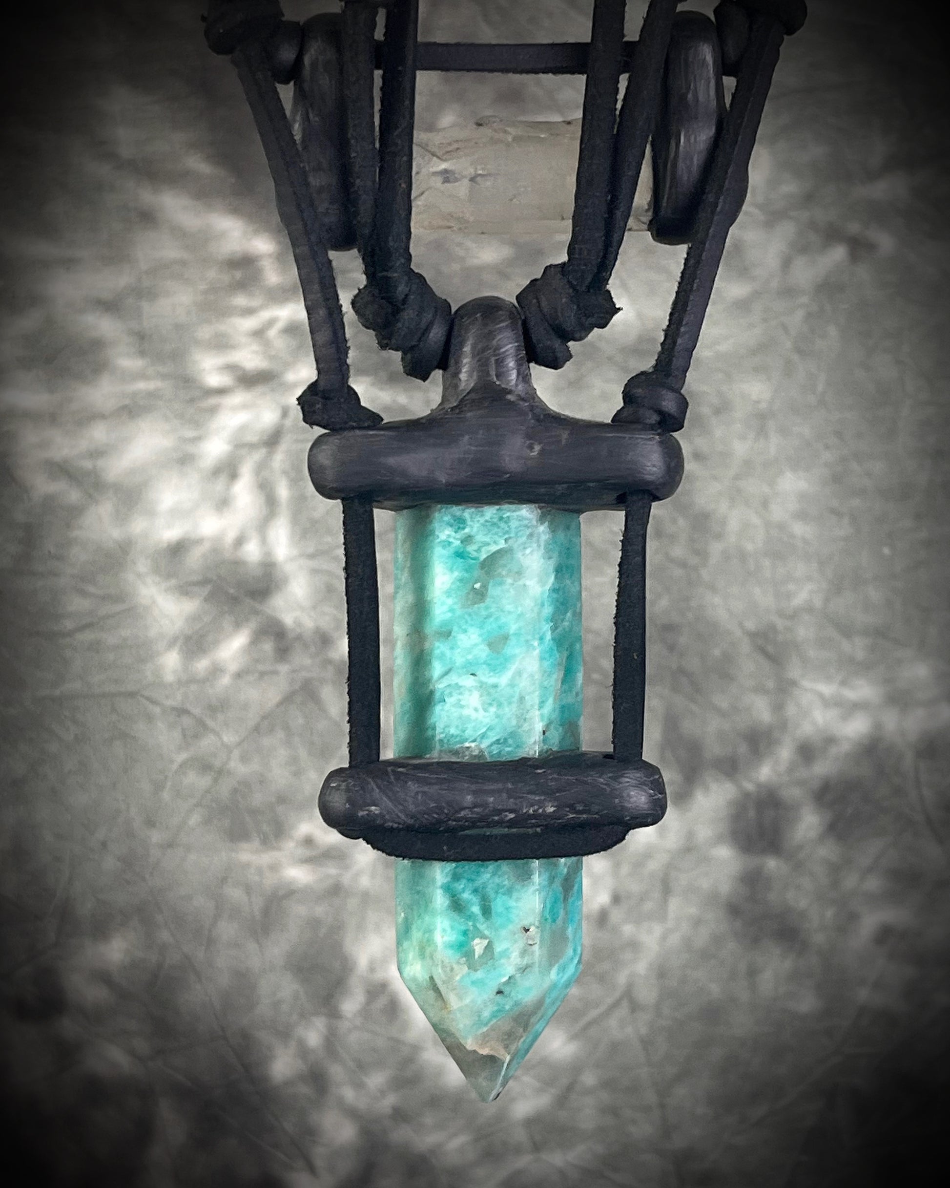 Handmade leather crystal necklace with XL amazonite point, quartz, chrysocolla, opalite, and handmade wire clasp by Anothai Hansen.