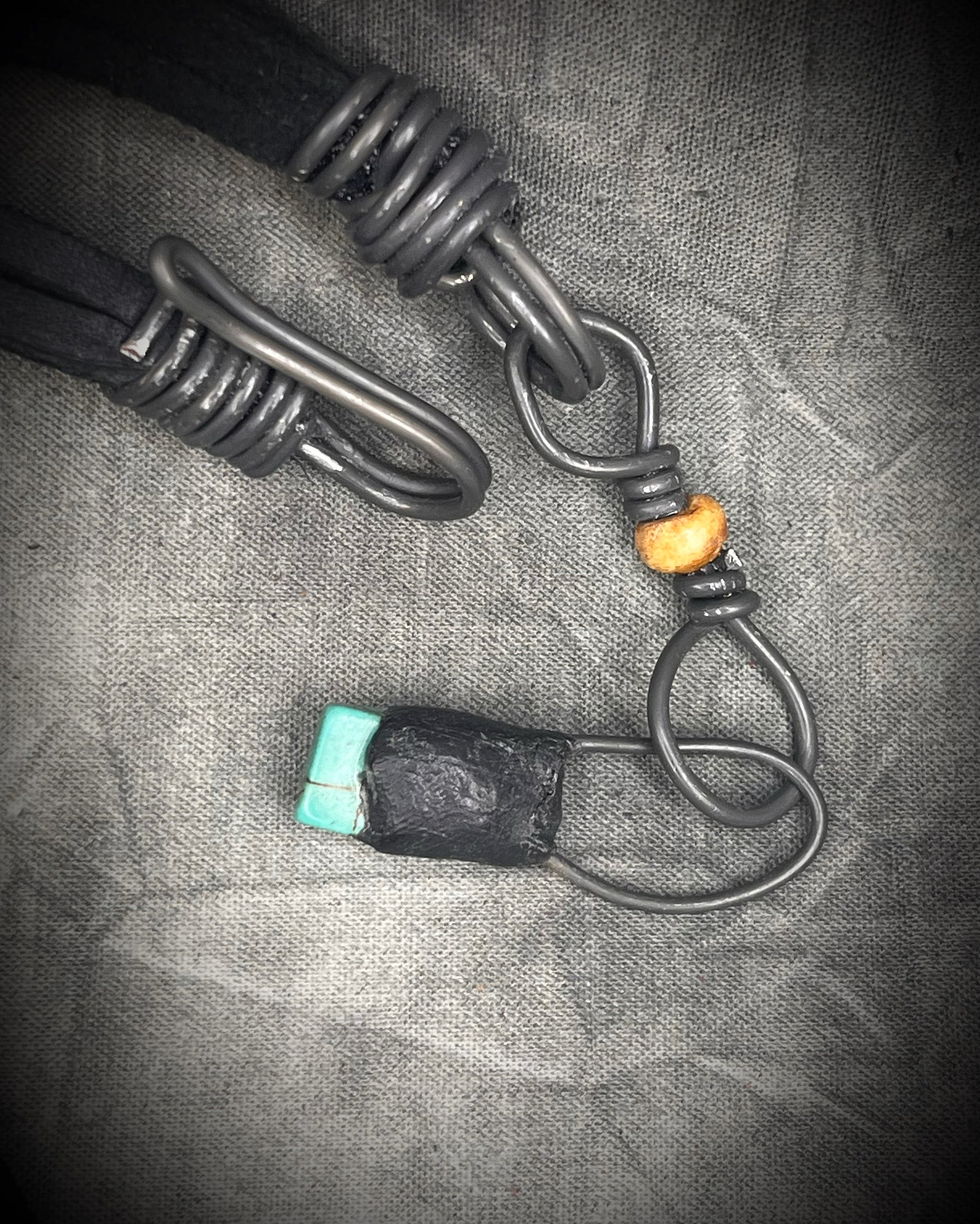 Handmade leather crystal necklace with XL amazonite point, quartz, chrysocolla, opalite, and handmade wire clasp by Anothai Hansen.