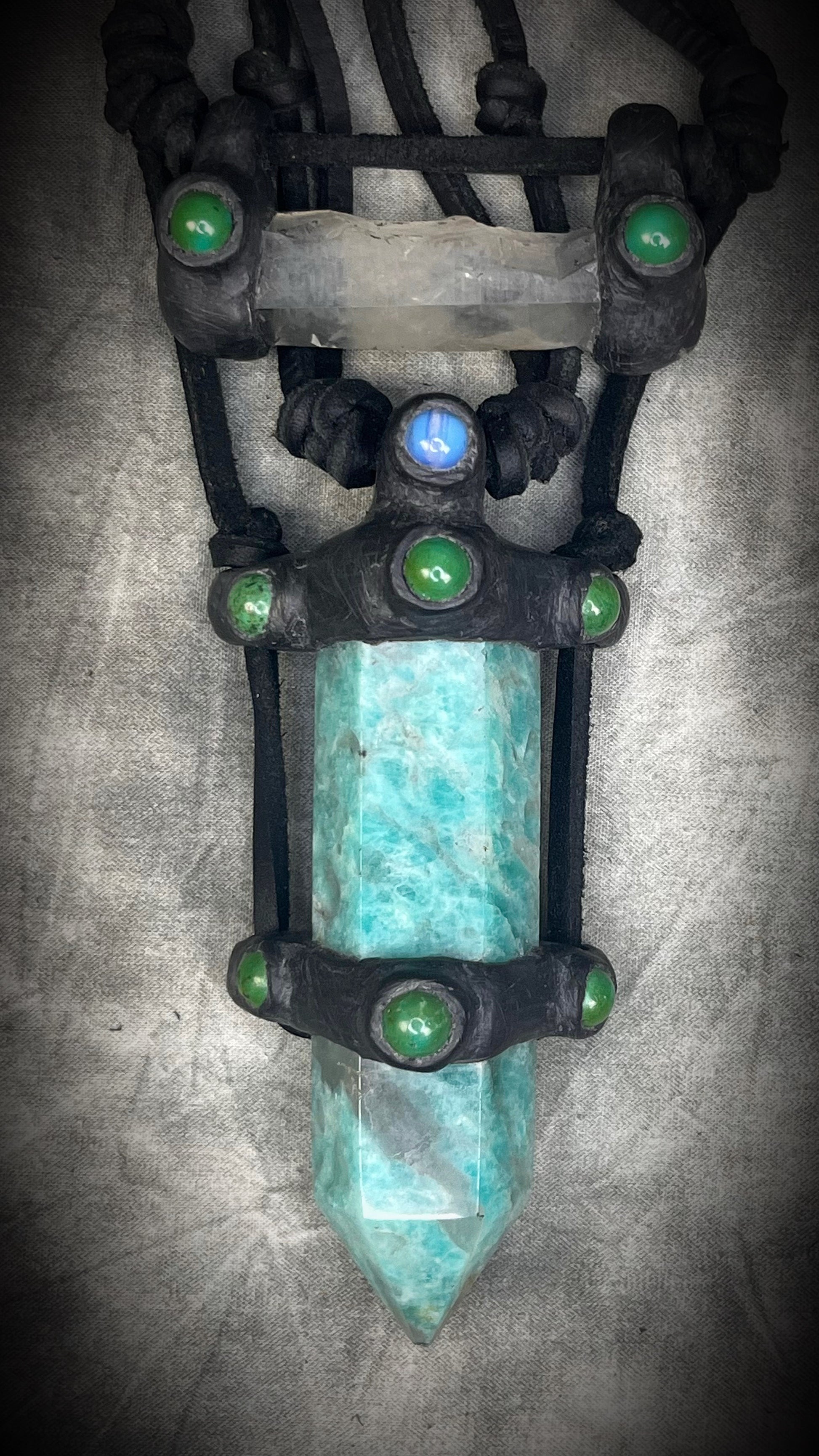 Handmade leather crystal necklace with XL amazonite point, quartz, chrysocolla, opalite, and handmade wire clasp by Anothai Hansen.