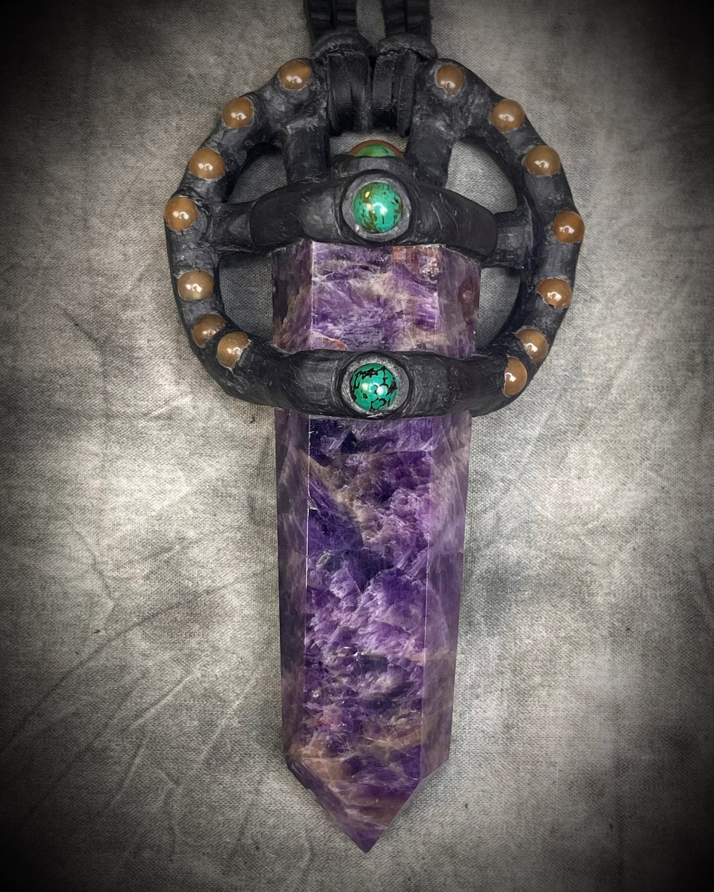 Handmade leather crystal necklace with XL amethyst point, honey jade, green chrysocolla, and handmade wire clasp by Anothai Hansen.