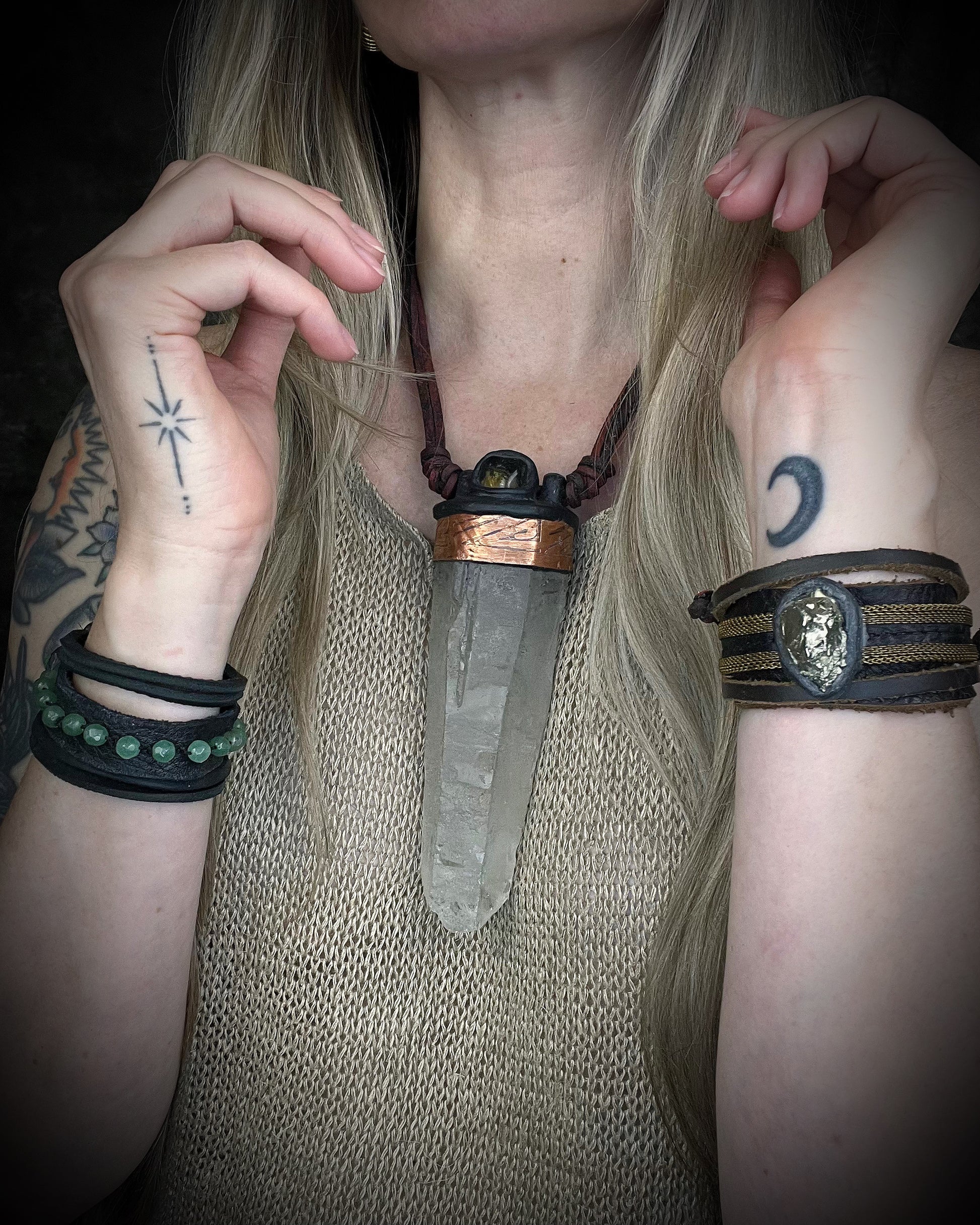 Handmade leather crystal necklace with XXL quartz point, citrine, copper details, black leather, and handmade wire clasp by Anothai Hansen.