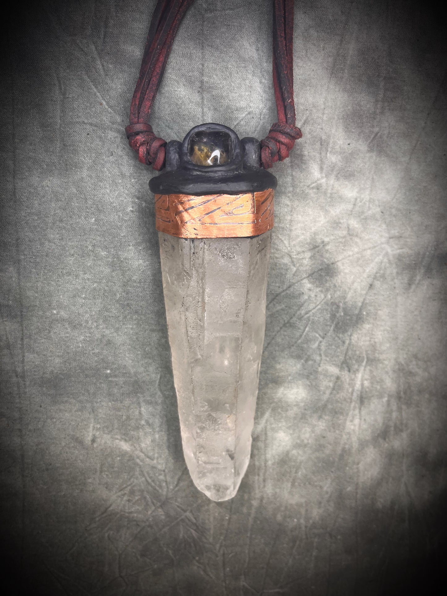 Handmade leather crystal necklace with XXL quartz point, citrine, copper details, black leather, and handmade wire clasp by Anothai Hansen.