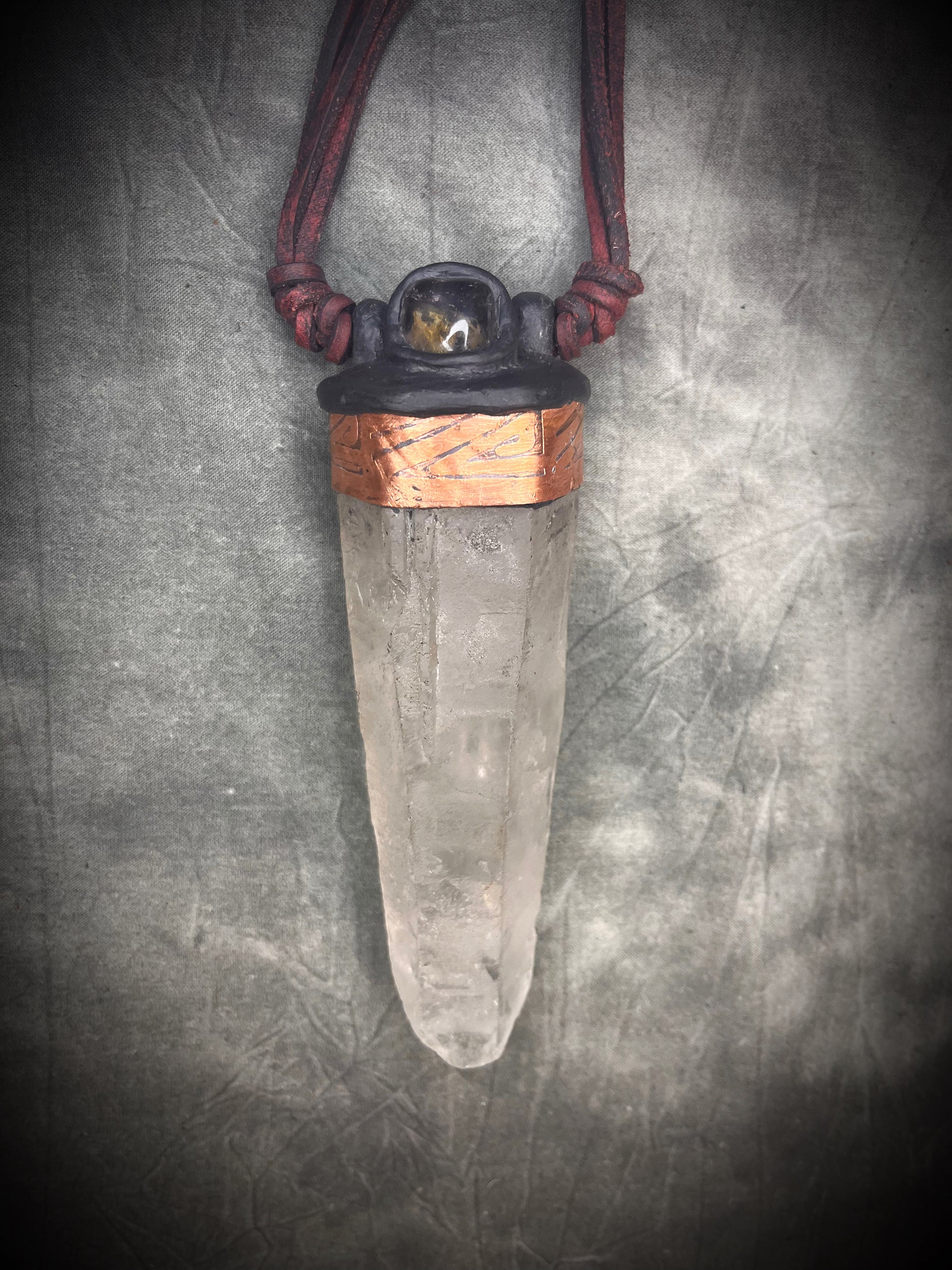Handmade leather crystal necklace with XXL quartz point, citrine, copper details, black leather, and handmade wire clasp by Anothai Hansen.
