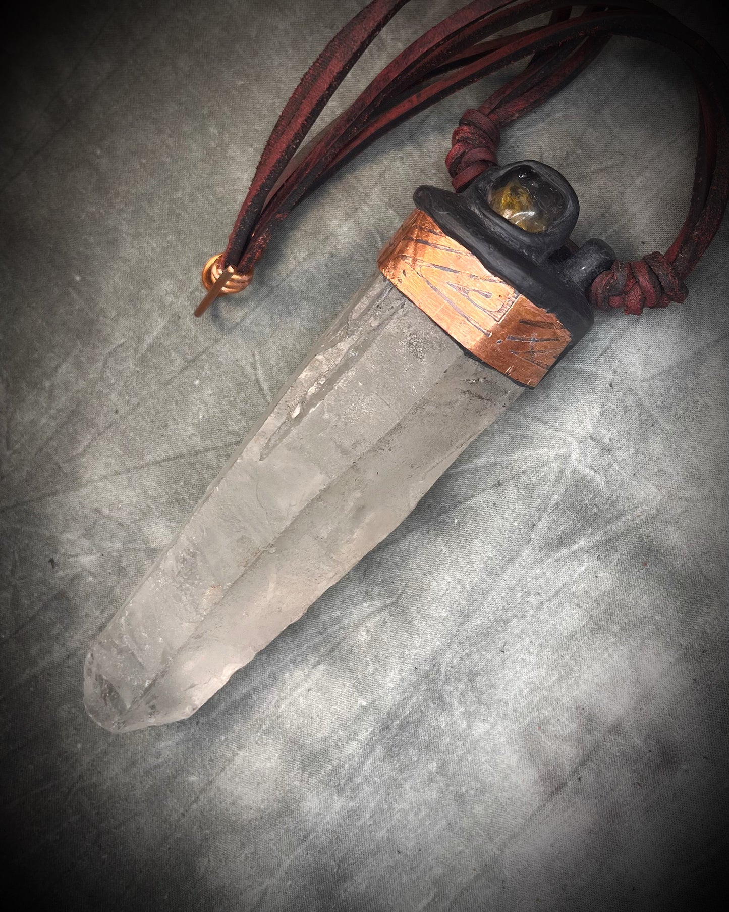 Handmade leather crystal necklace with XXL quartz point, citrine, copper details, black leather, and handmade wire clasp by Anothai Hansen.