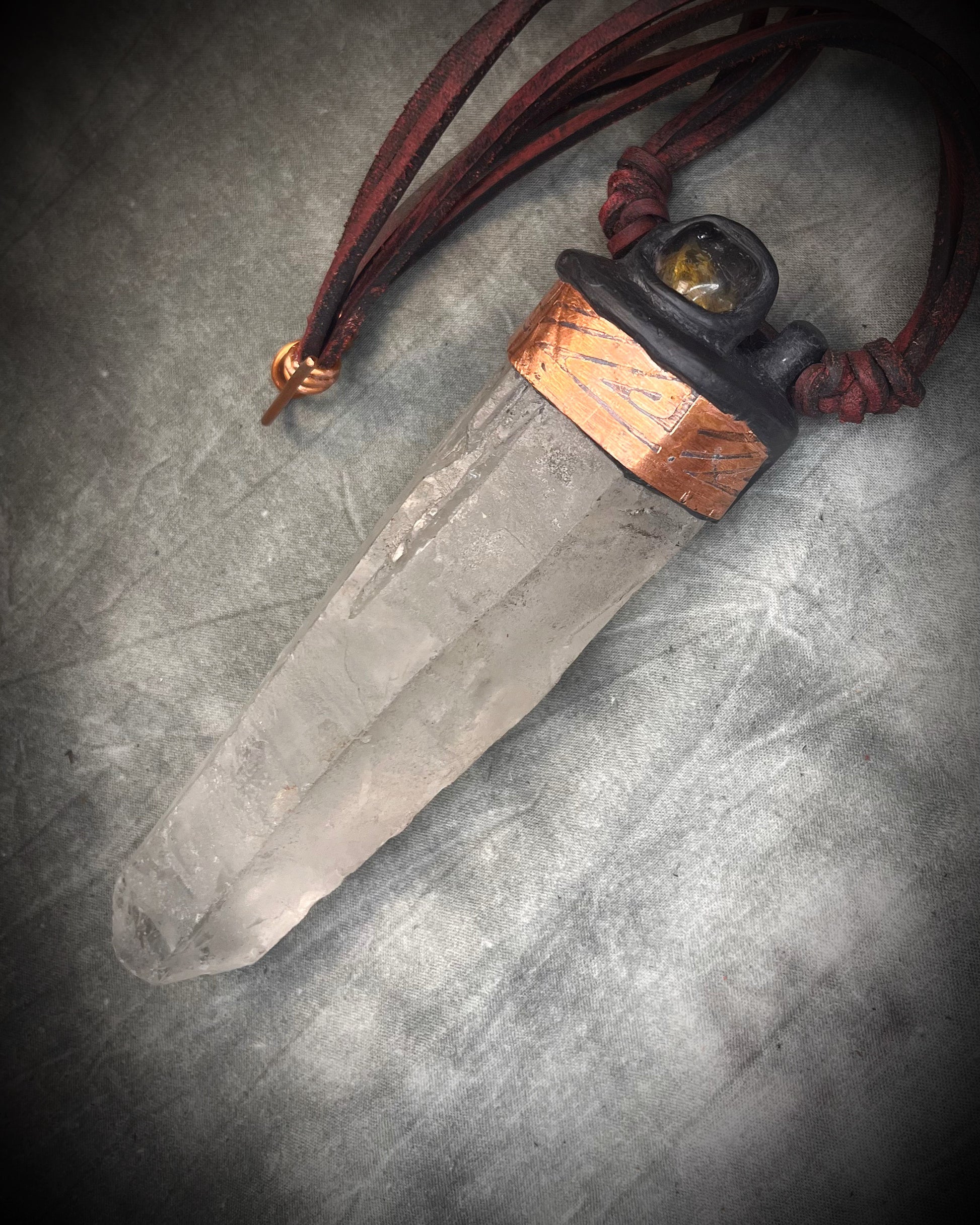 Handmade leather crystal necklace with XXL quartz point, citrine, copper details, black leather, and handmade wire clasp by Anothai Hansen.