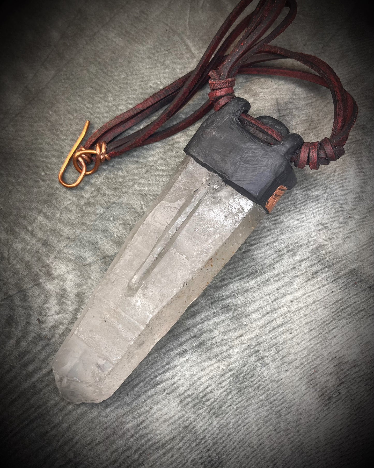 Handmade leather crystal necklace with XXL quartz point, citrine, copper details, black leather, and handmade wire clasp by Anothai Hansen.