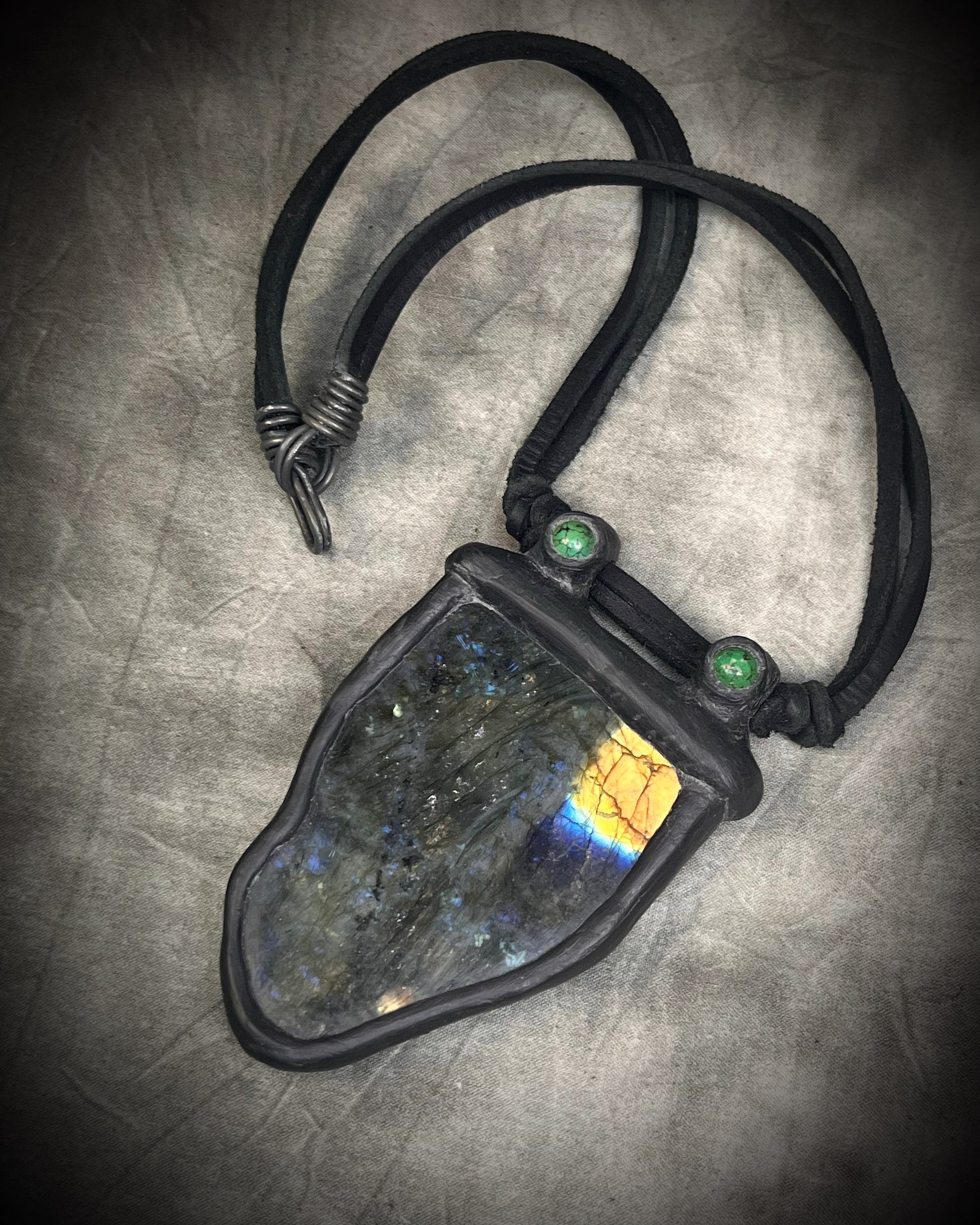 Handmade leather crystal necklace with labradorite and green chrysocolla featuring a handmade wire clasp by Anothai Hansen.