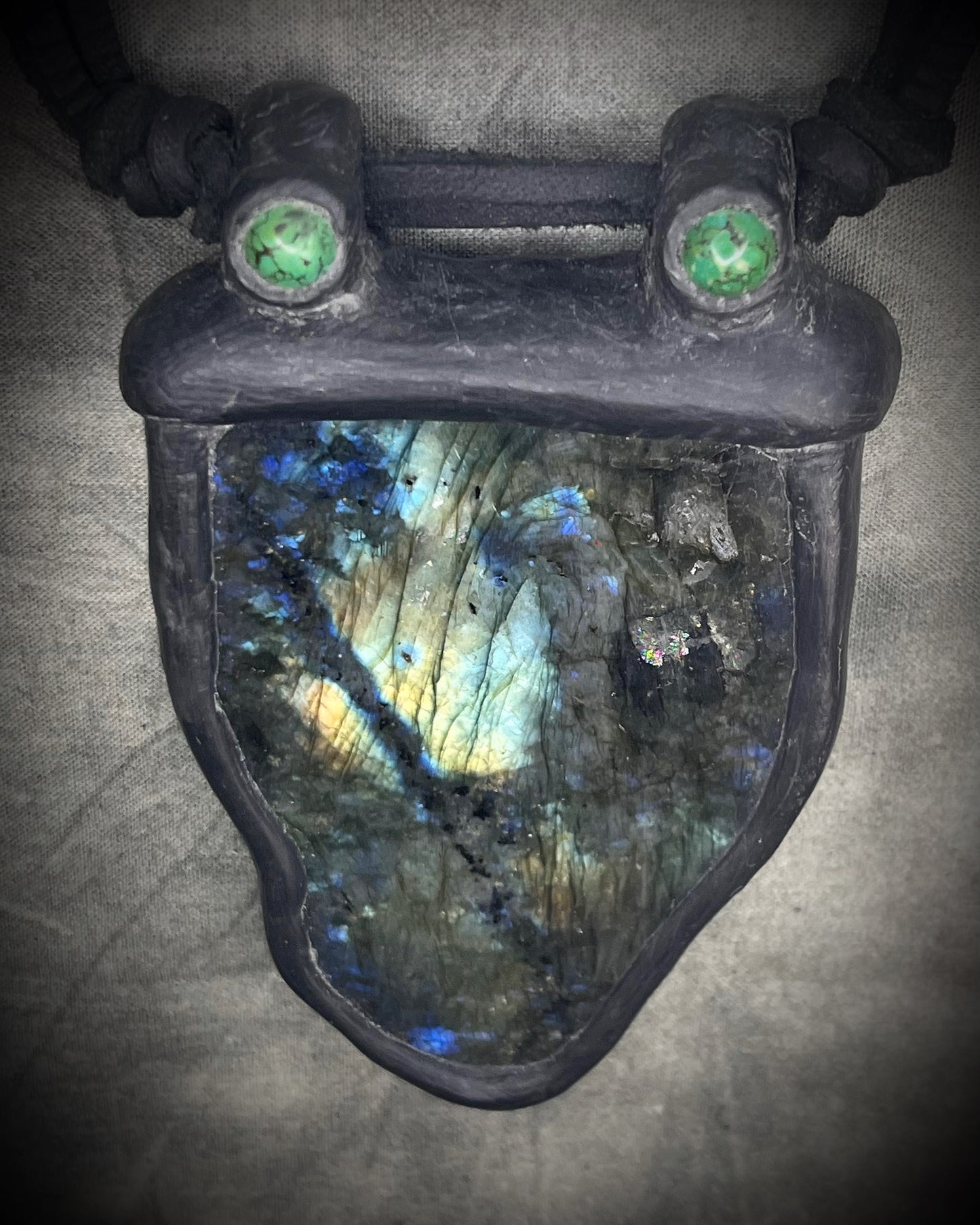 Handmade leather crystal necklace with labradorite and green chrysocolla featuring a handmade wire clasp by Anothai Hansen.