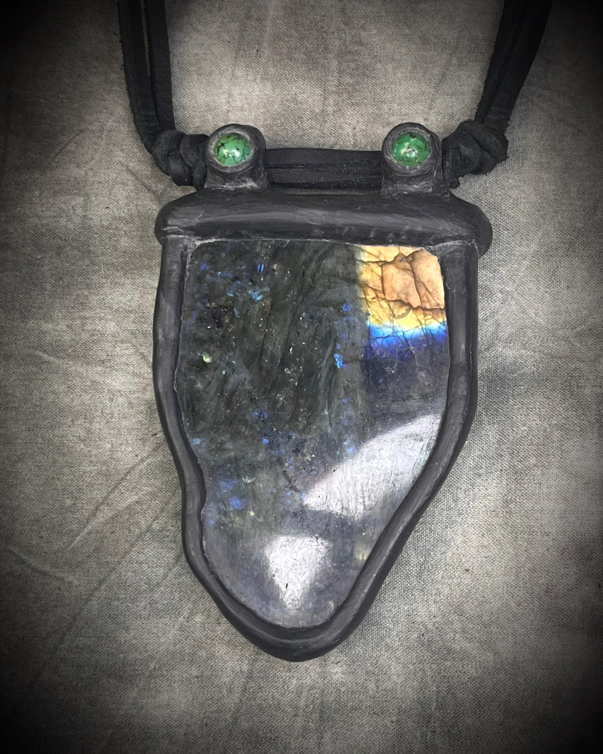 Handmade leather crystal necklace with labradorite and green chrysocolla featuring a handmade wire clasp by Anothai Hansen. 