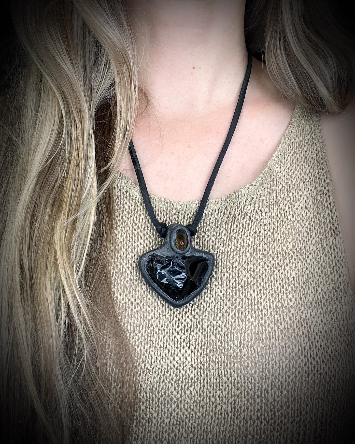 Handmade obsidian pendant with citrine crystal on black leather featuring a handmade wire clasp, rugged artisan gemstone necklace by Anothai Hansen.
