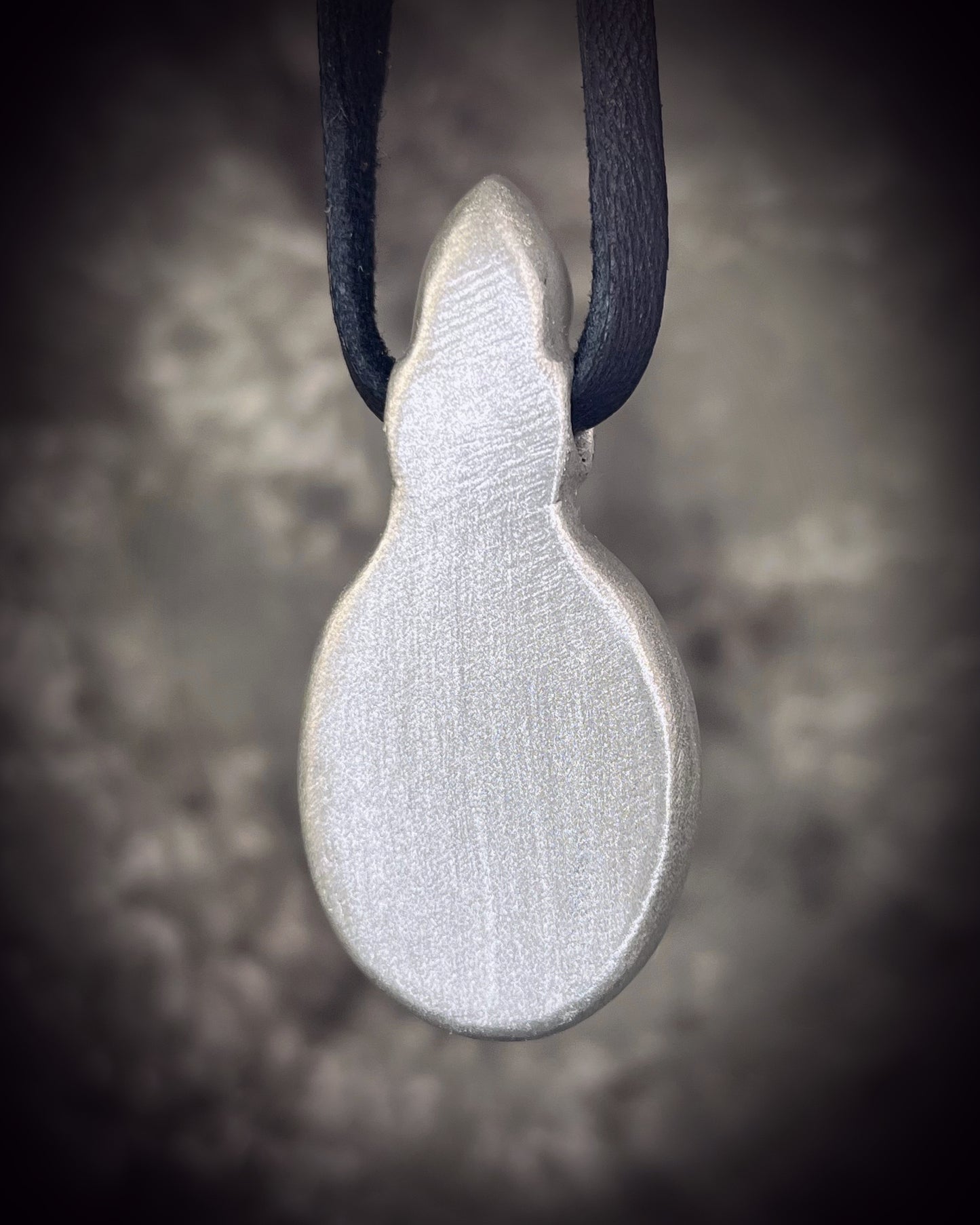 Handmade turquoise and moonstone crystal necklace suspended from leather, featuring natural turquoise and luminous moonstone, artisan jewelry by Become Spellbound.