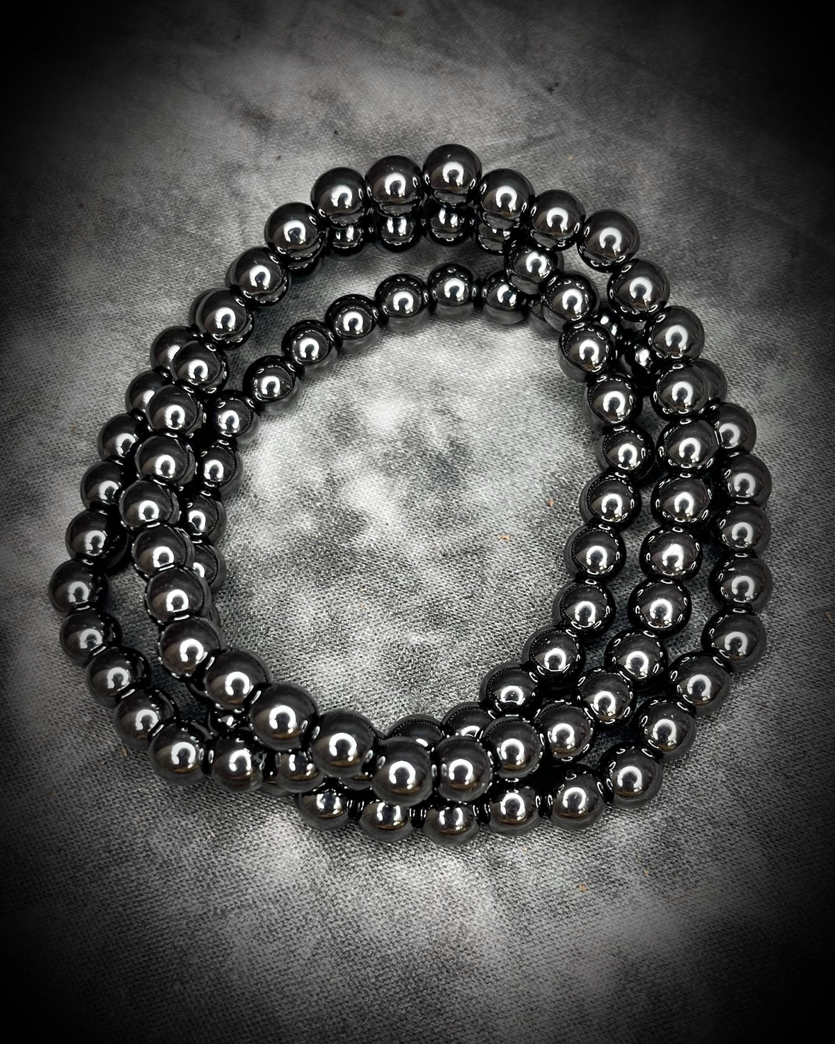 Hematite natural crystal healing beaded bracelets for protection, grounding, emf shielding and gemstone magic!  Crystal stacking bracelets for holiday gifting and new year resolution setting.
