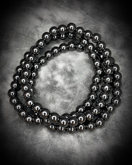 Hematite natural crystal healing beaded bracelets for protection, grounding, emf shielding and gemstone magic!  Crystal stacking bracelets for holiday gifting and new year resolution setting.