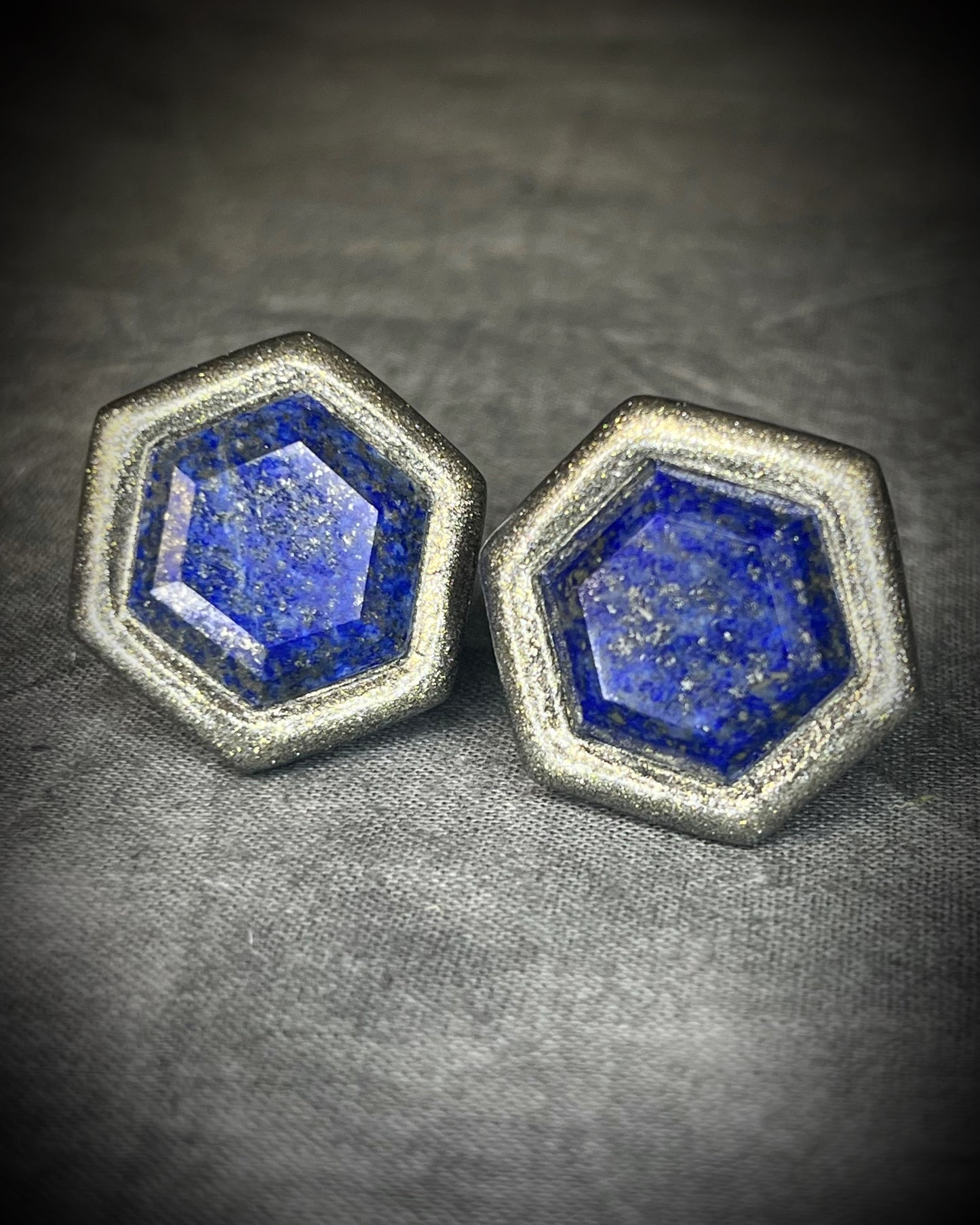 Hexagon-shaped lapis lazuli cufflinks with deep blue natural stone and stainless steel findings, handmade by Become Spellbound.