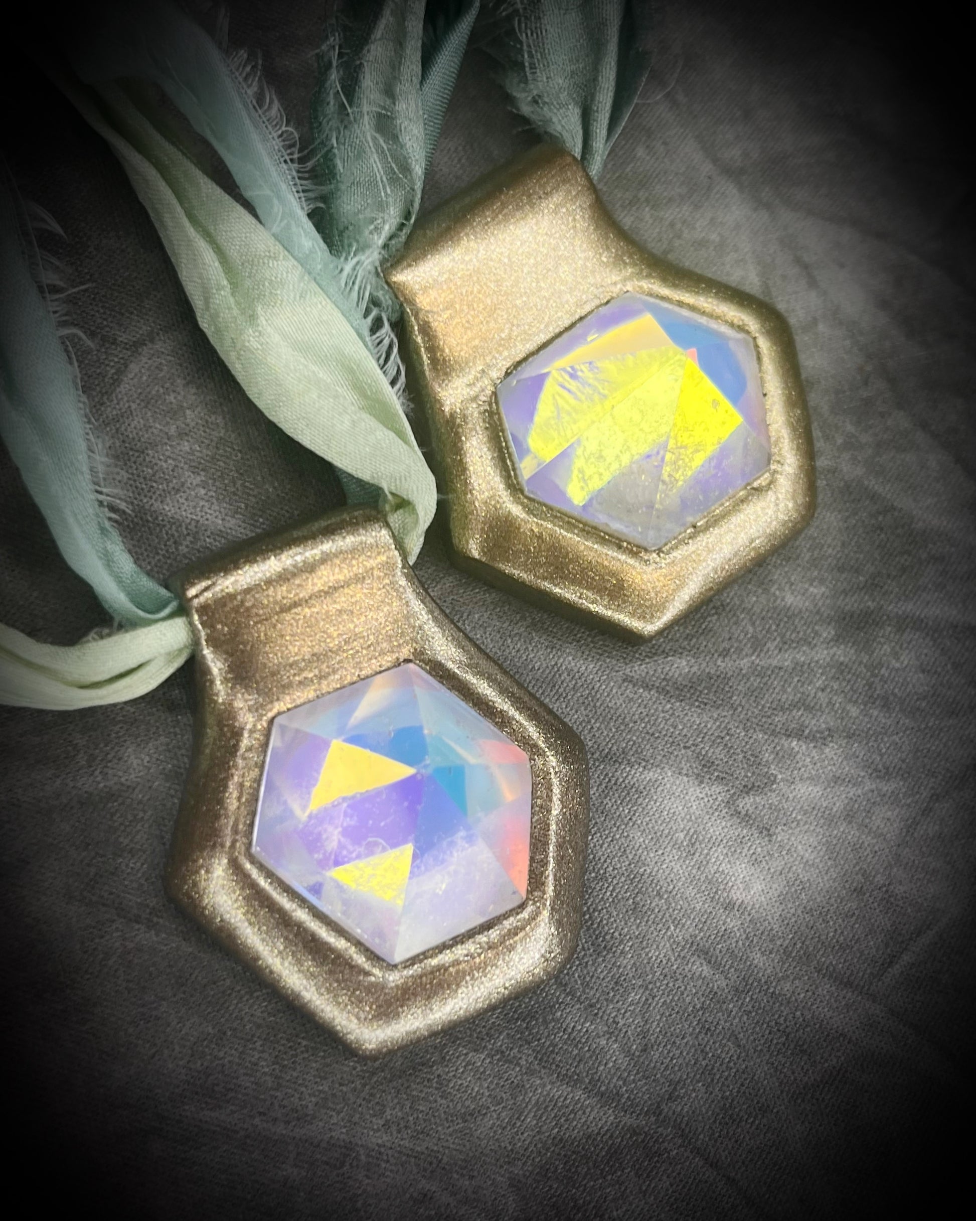 Hexagonal gold pendants on aqua recycled silks in a gold finish. Quartz crystal glowing opalescent beachy pendant. Summer jewelry gift for her. 