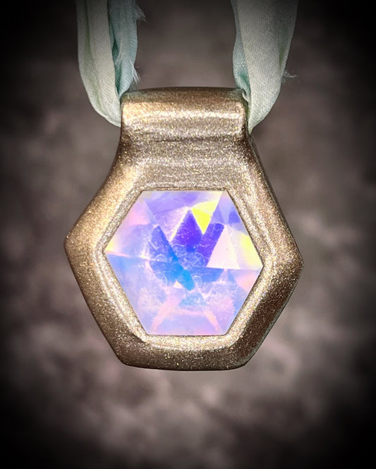 Hexagonal gold pendants on aqua recycled silks in a gold finish. Quartz crystal glowing opalescent beachy pendant. Summer jewelry gift for her. 