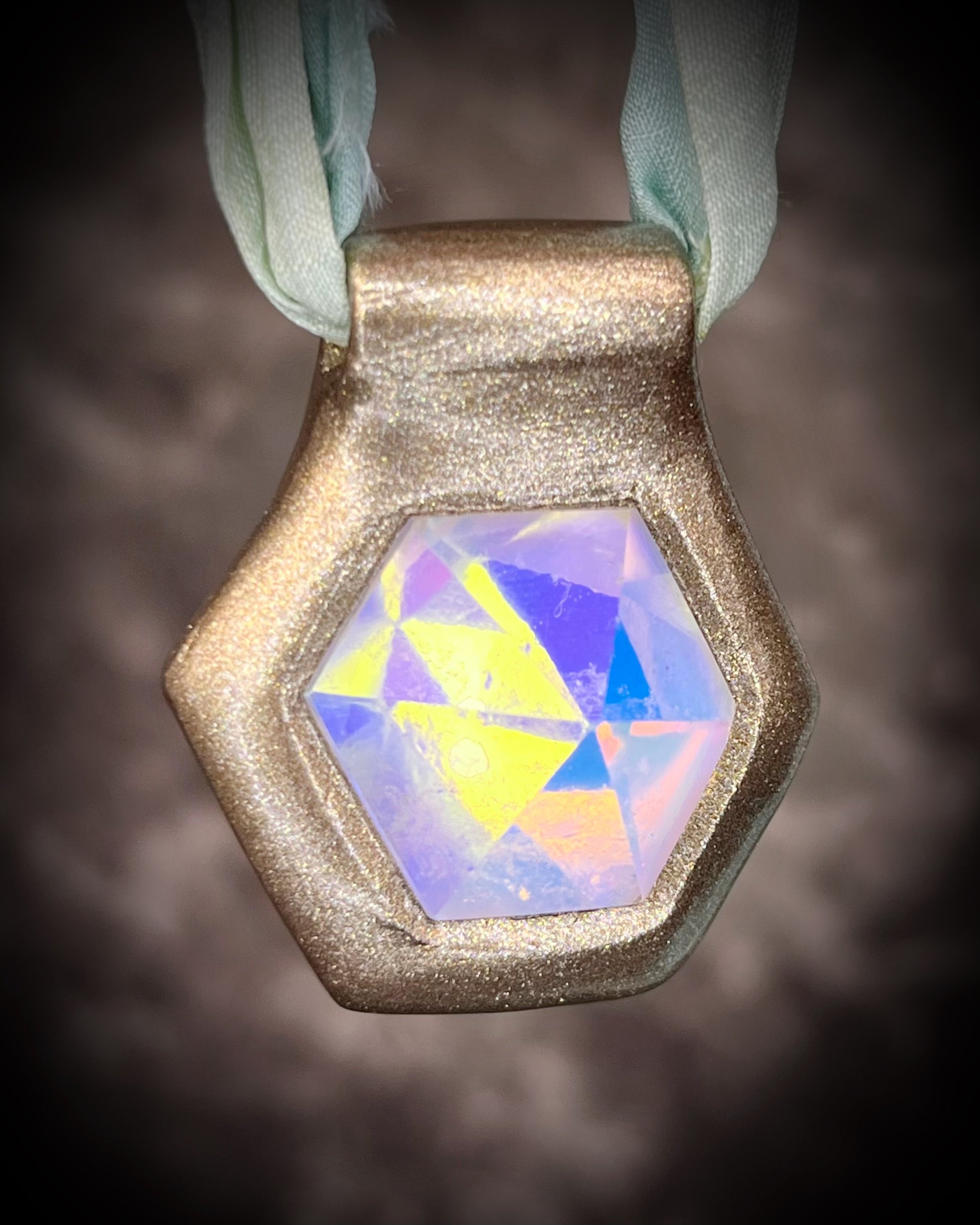 Hexagonal gold pendants on aqua recycled silks in a gold finish. Quartz crystal glowing opalescent beachy pendant. Summer jewelry gift for her. 