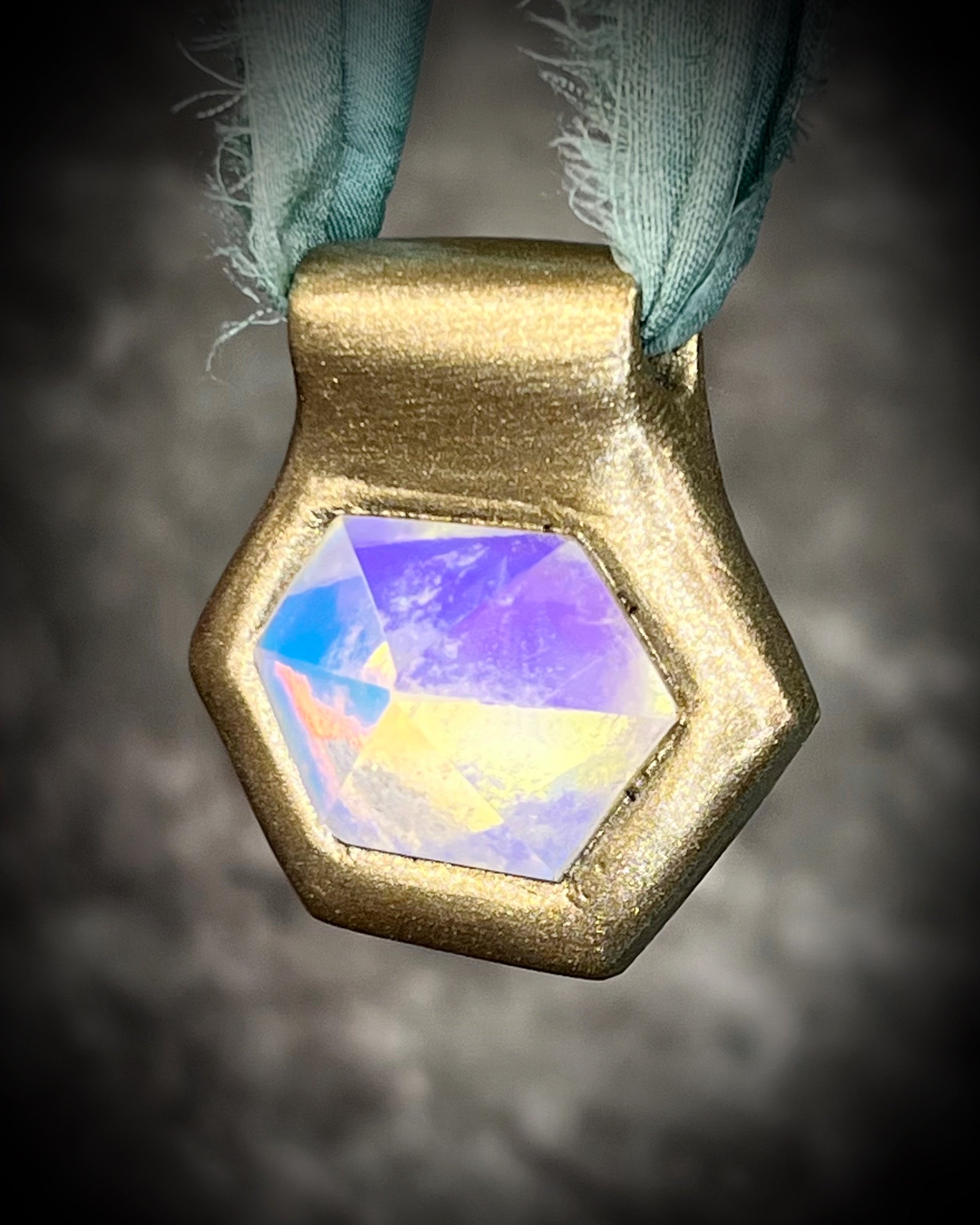 Hexagonal gold pendants on aqua recycled silks in a gold finish. Quartz crystal glowing opalescent beachy pendant. Summer jewelry gift for her. 