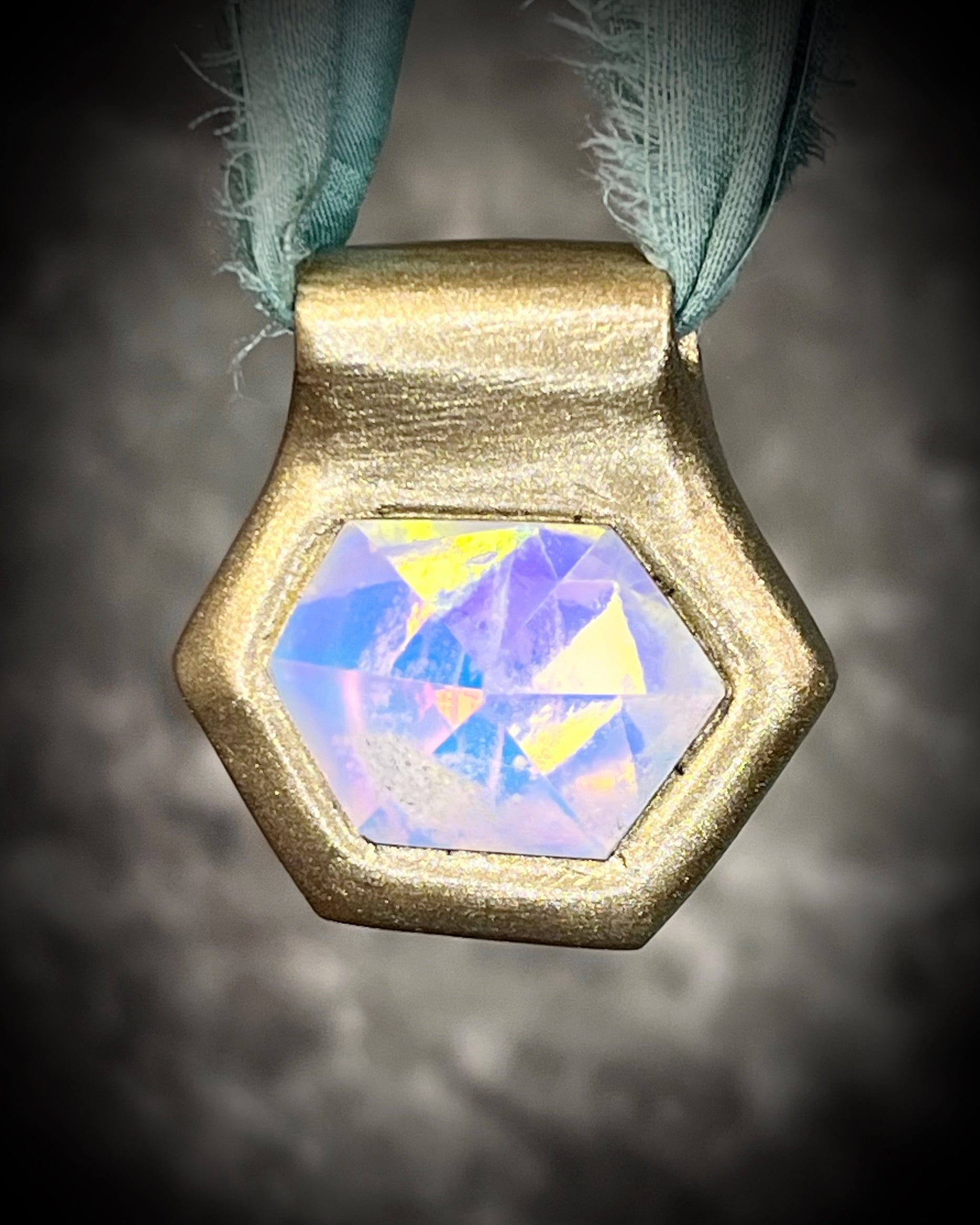 Hexagonal gold pendants on aqua recycled silks in a gold finish. Quartz crystal glowing opalescent beachy pendant. Summer jewelry gift for her. 