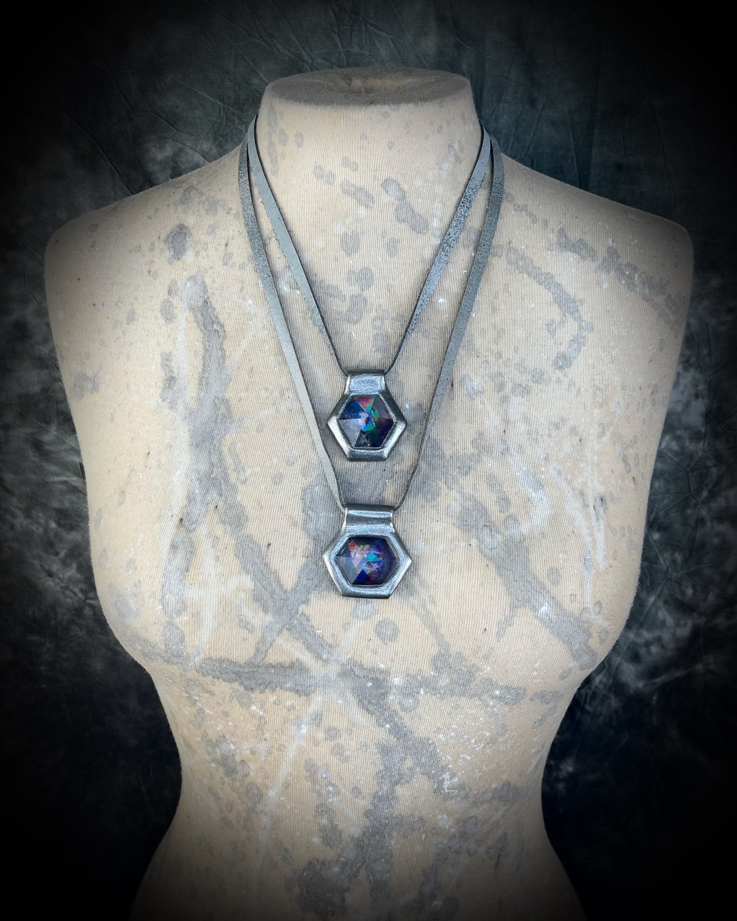Stacked gunmetal silver David Bowie inspired designer quartz black rainbow necklaces. On matching silver leather adjustable & customizable from choker to pendant. 