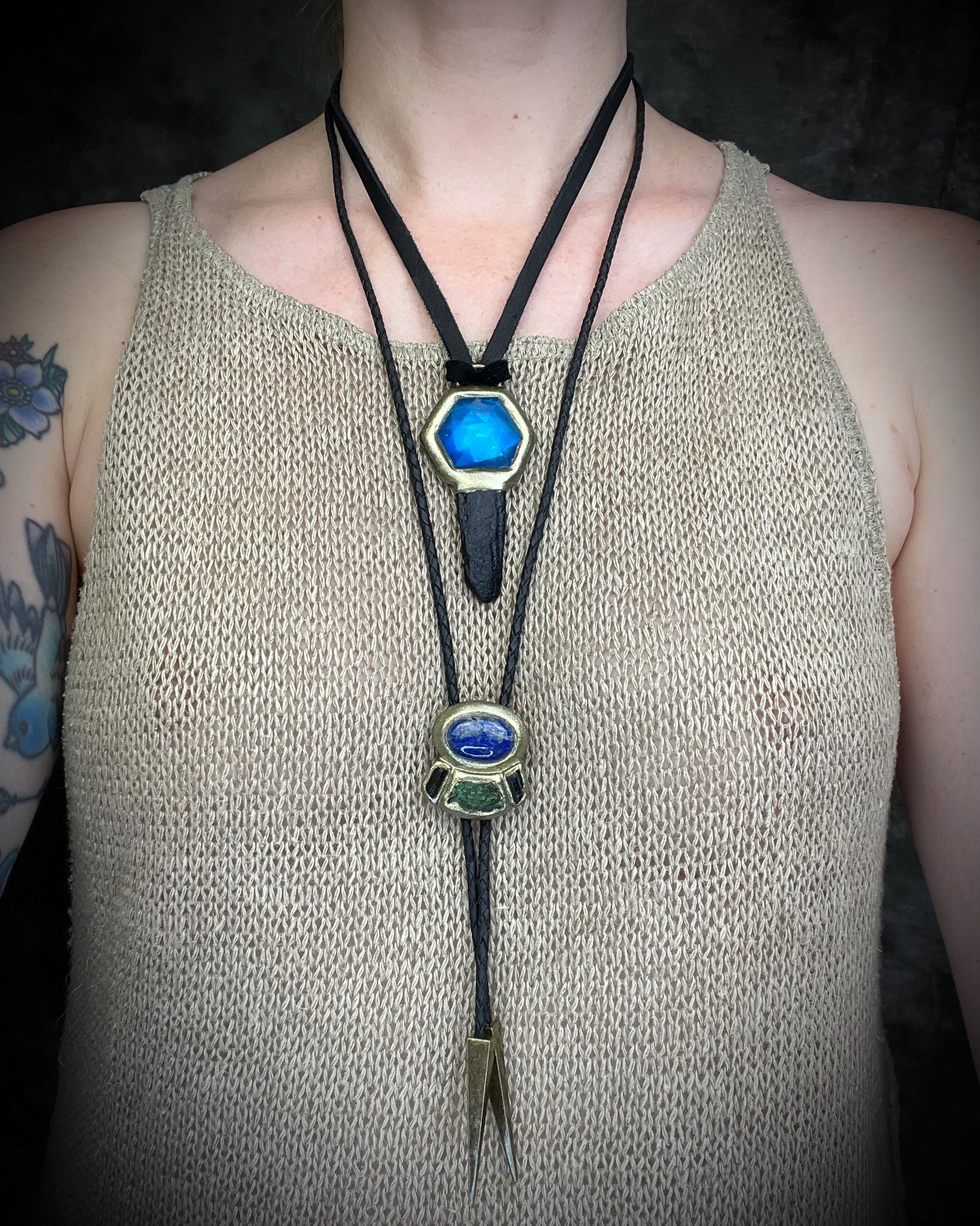 Indochinite tektite and quartz crystal talisman on leather, handmade in Baltimore, Maryland by Become Spellbound.