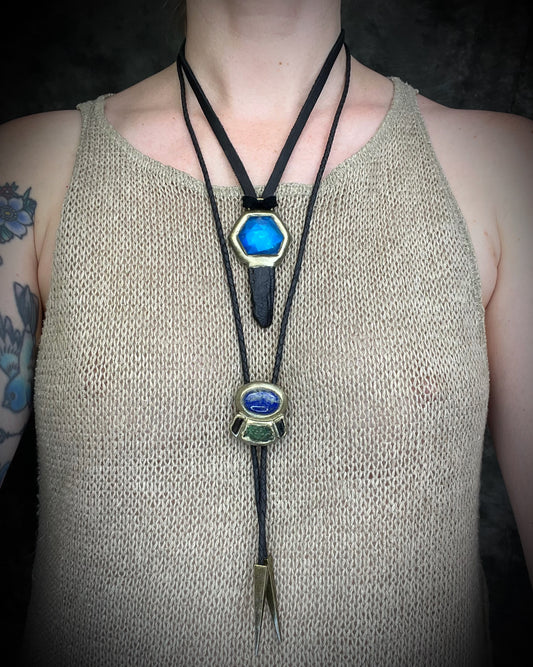 Indochinite tektite and quartz crystal talisman on leather, handmade in Baltimore, Maryland by Become Spellbound.
