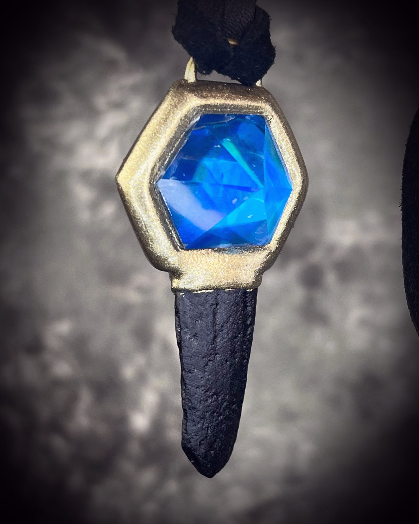 Indochinite tektite and quartz crystal talisman on leather, handmade in Baltimore, Maryland by Become Spellbound.