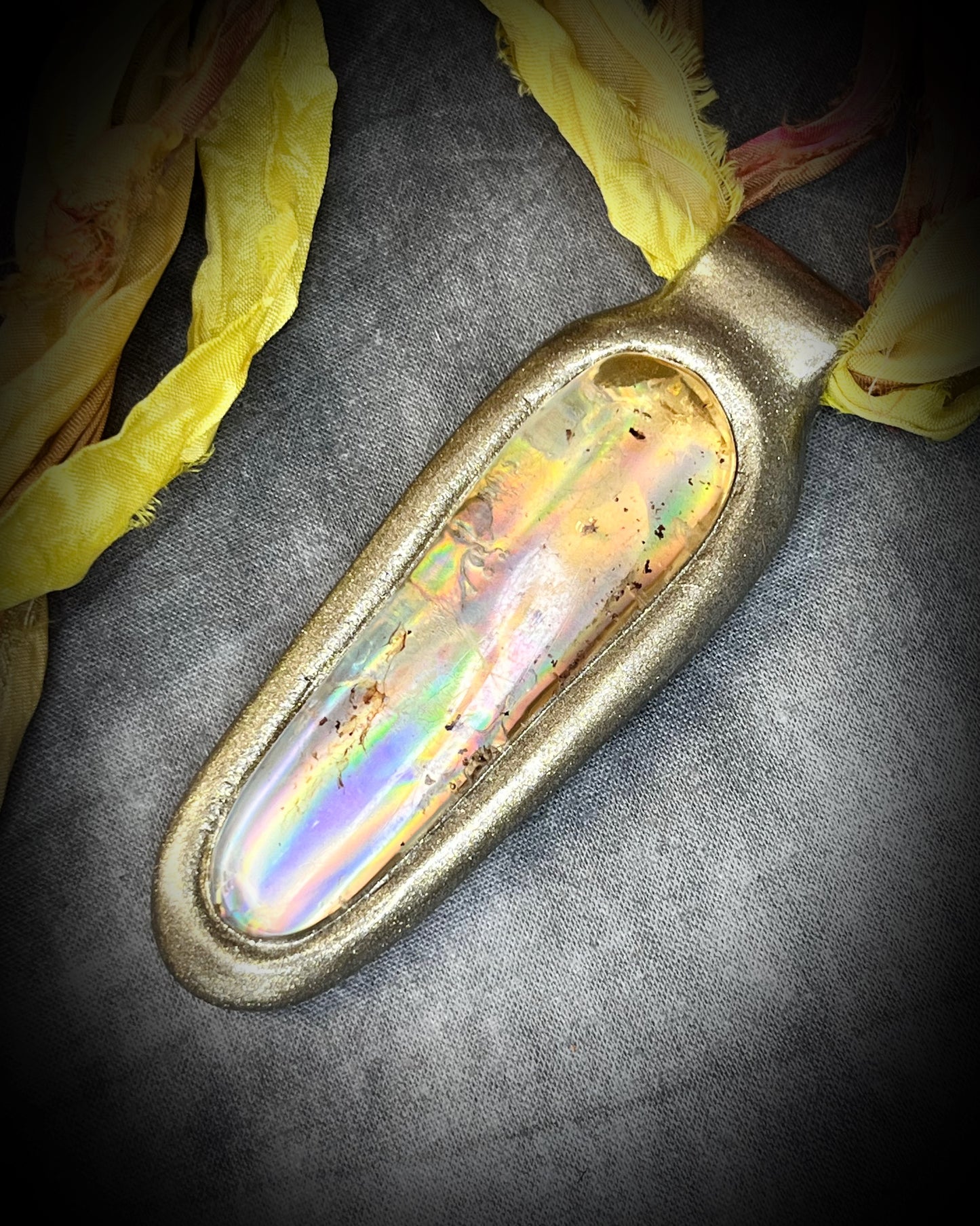 Insect included amber pendant in gold finish on marigold and yellow recycled silks. Enchanting museum of natural history holiday gift for her!