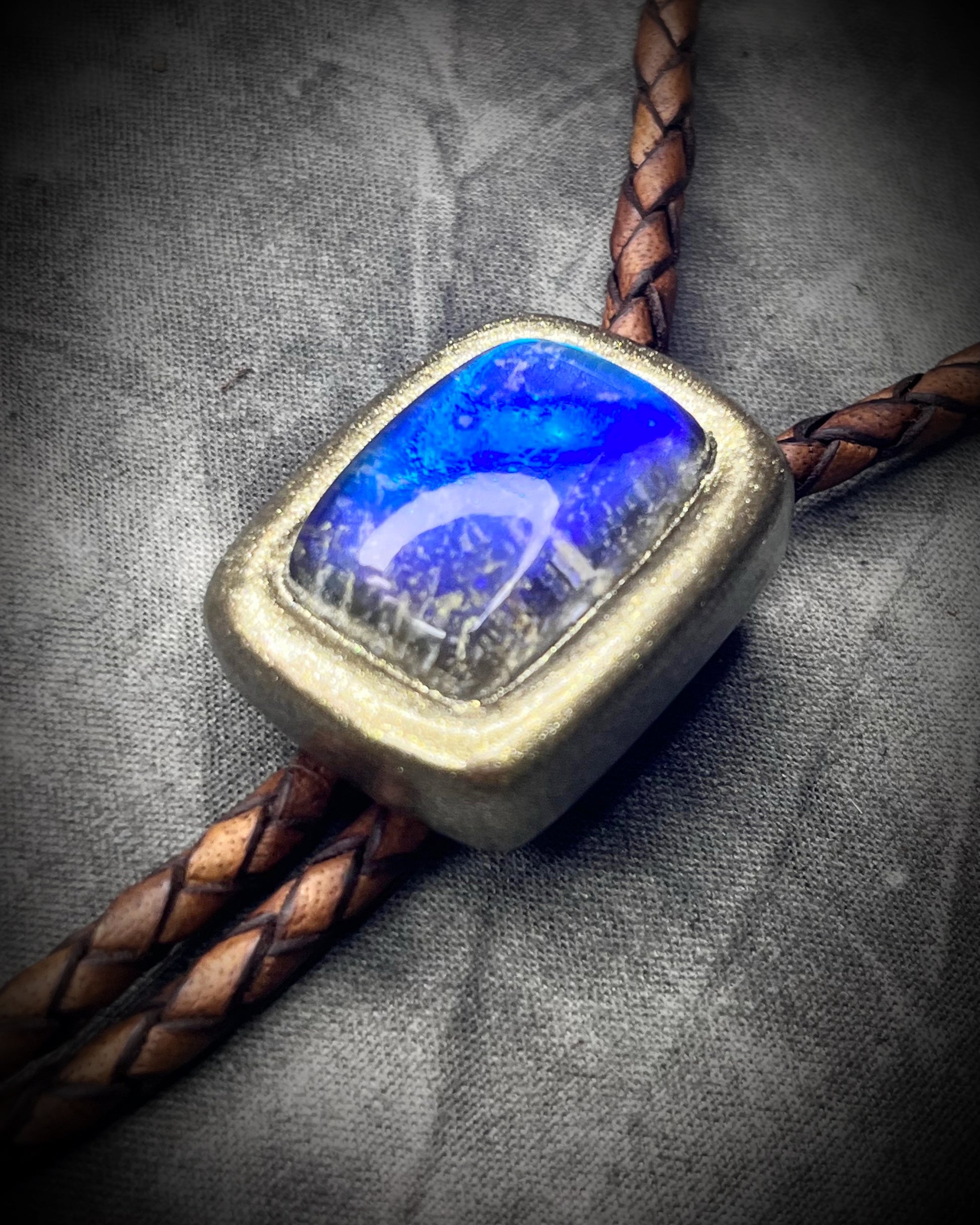 Labradorite and Quartz doublet gold bolo tie on brown leather – artisan crystal bolo necklace, mystical men’s bolo tie, handmade gemstone statement jewelry.