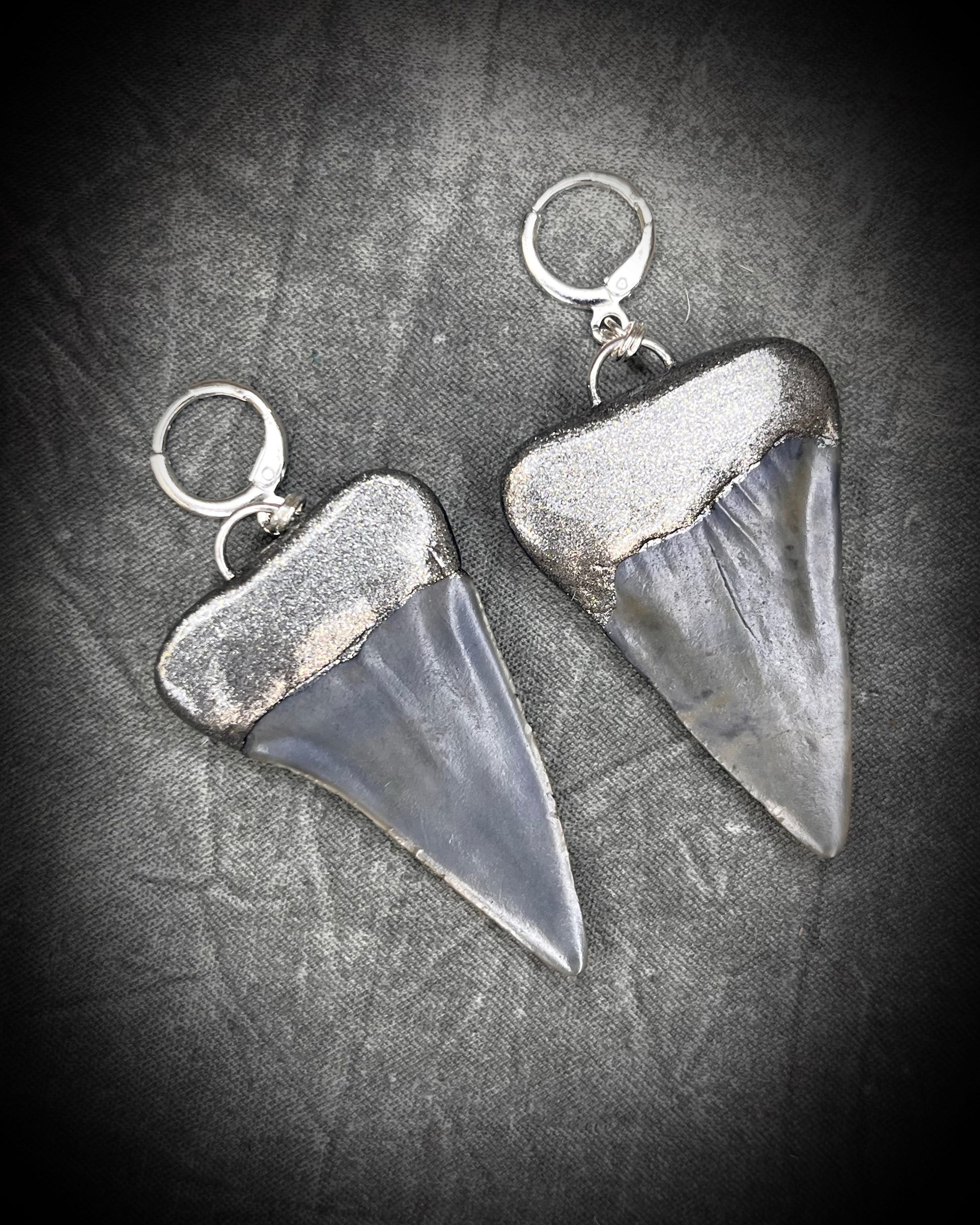 Mako shark tooth fossil earrings in silver finish with sterling-plated huggie hooks, ocean-inspired statement fossil jewelry handmade in Baltimore Maryland