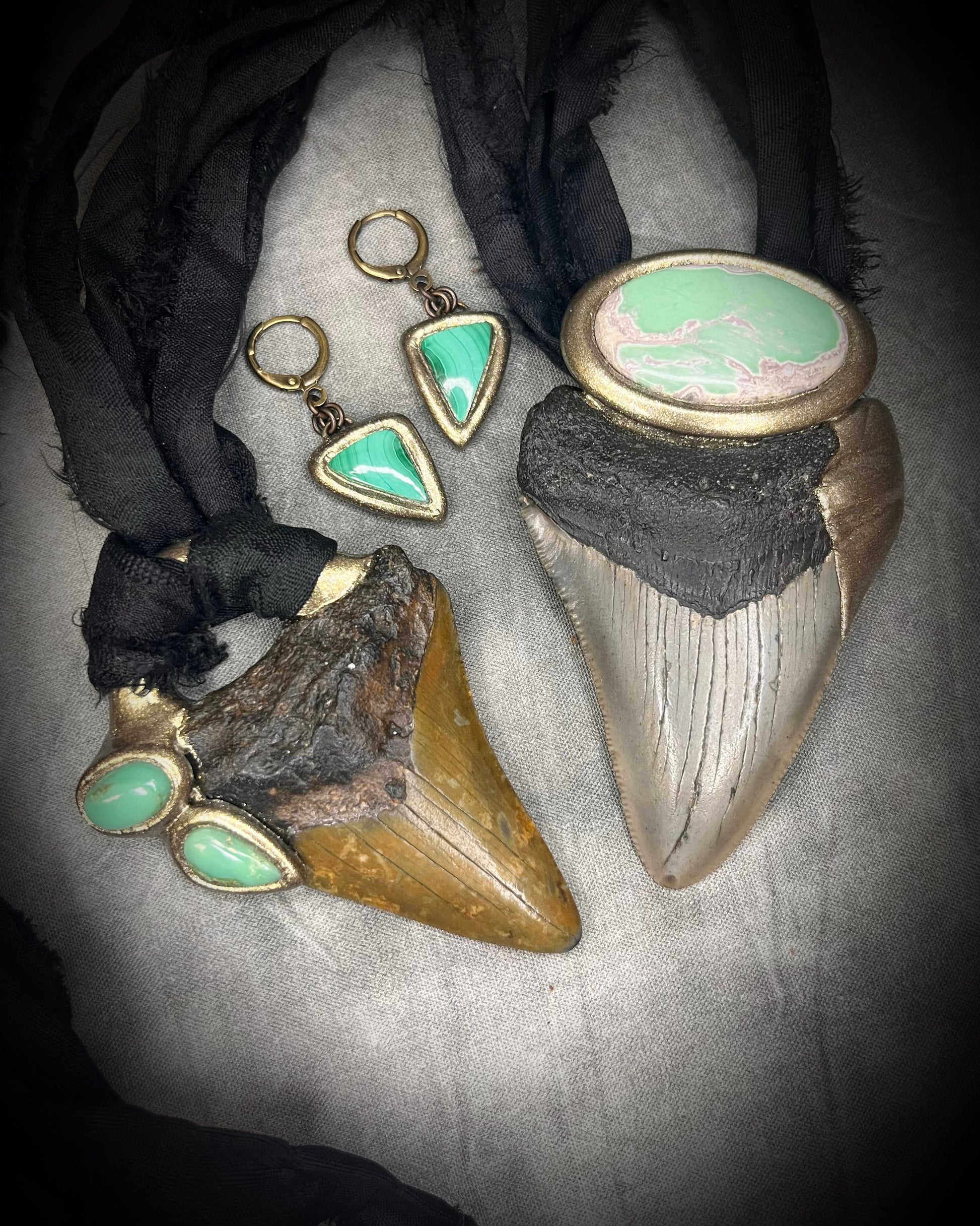Malachite Dangle Earrings in Gold Finish - Earthy and Empowering Drop Earrings gift for her. Shown here with 2 crystal and megalodon fossil necklaces on black recycled silk. 