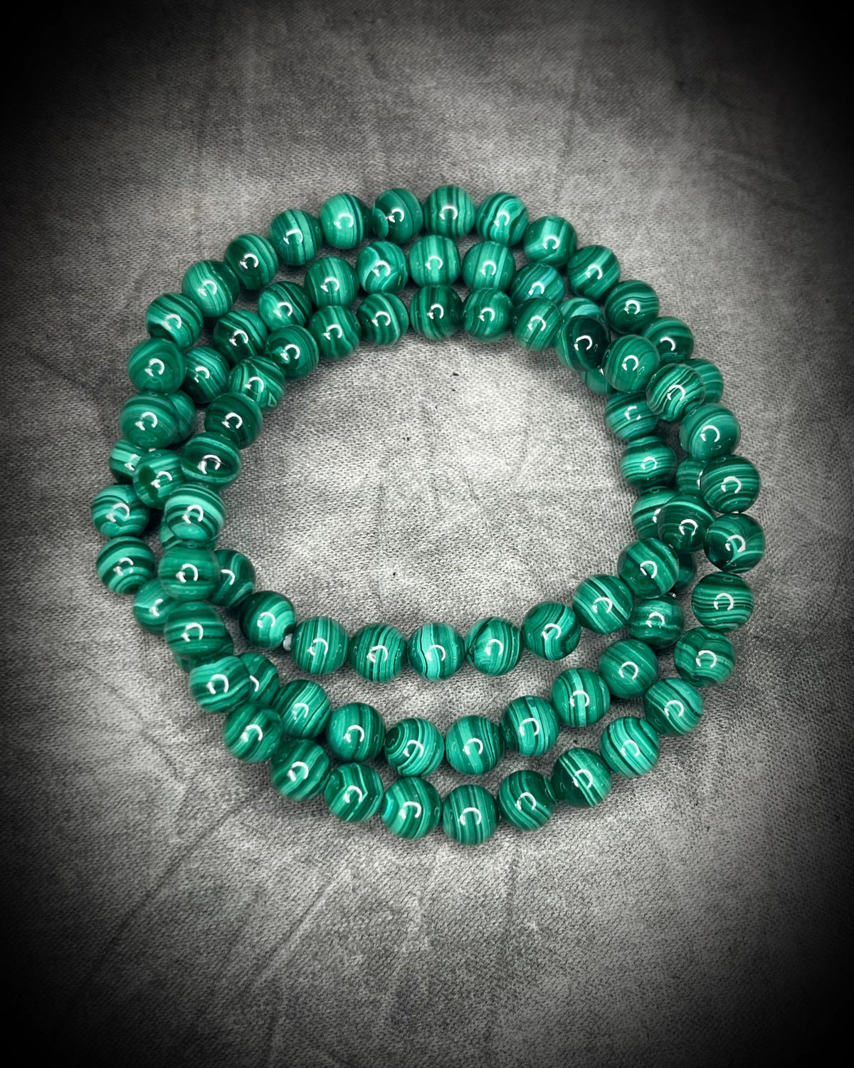 Malachite crystal healing beaded bracelets for protection, grounding, emf shielding and gemstone magic!  Crystal stacking bracelets for gifting and everyday magic.