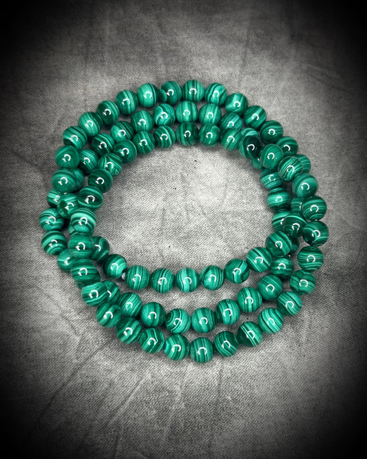 Malachite crystal healing beaded bracelets for protection, grounding, emf shielding and gemstone magic!  Crystal stacking bracelets for gifting and everyday magic.
