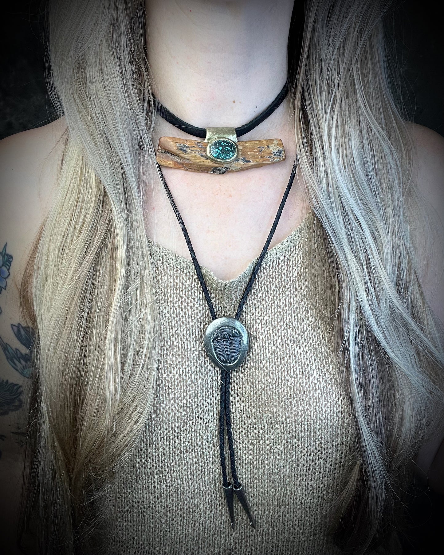 Mammoth tusk fossil and turquoise talisman on black leather, one-of-a-kind natural history jewelry handmade by Become Spellbound in Baltimore, Maryland.