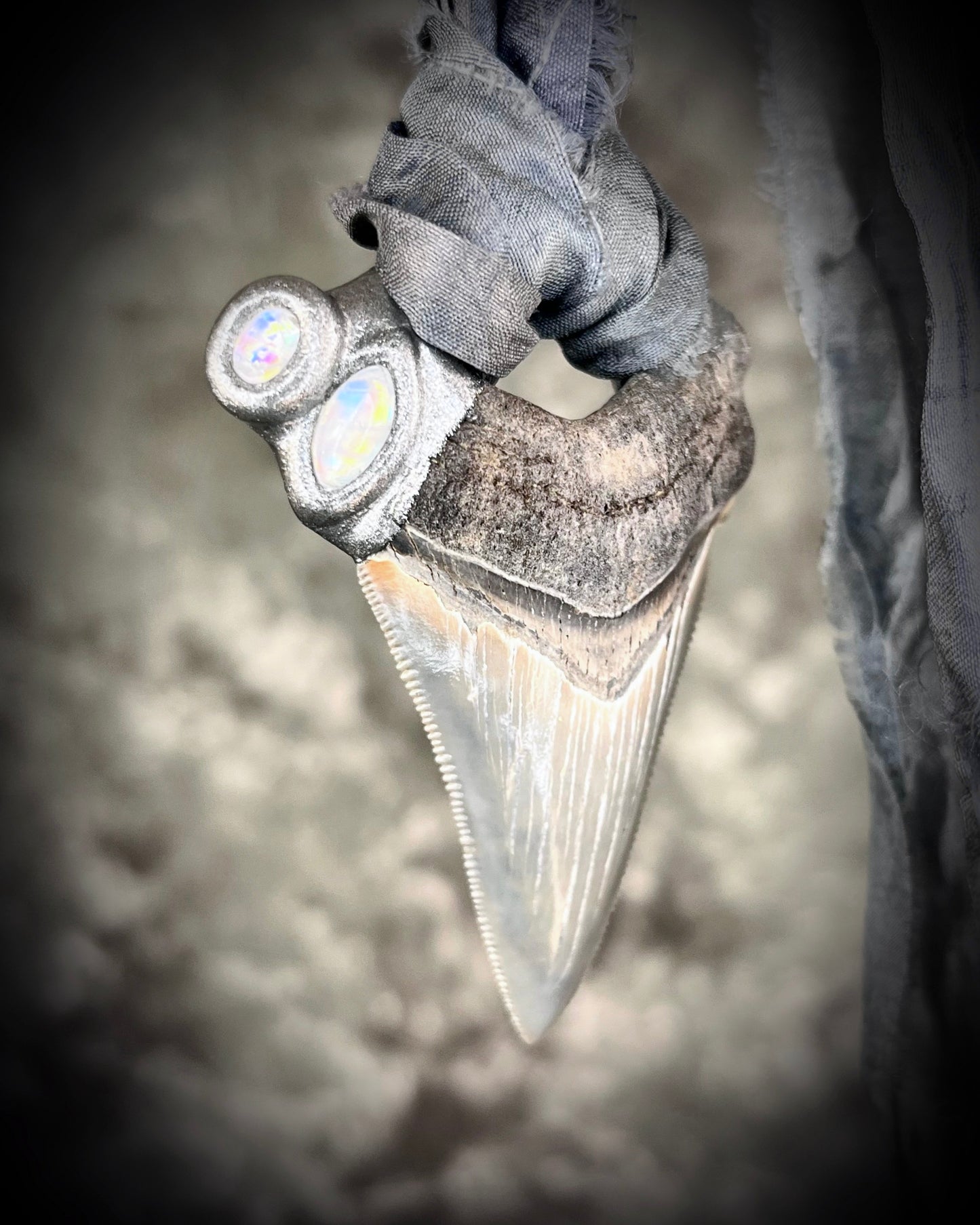 Megalodon shark tooth fossil handcrafted crystal talisman featuring rainbow moonstones in silver, hung from recycled slate gray silk. Beach wedding or beach photoshoot, cosplay, fantasy film costume or everyday enchantment!