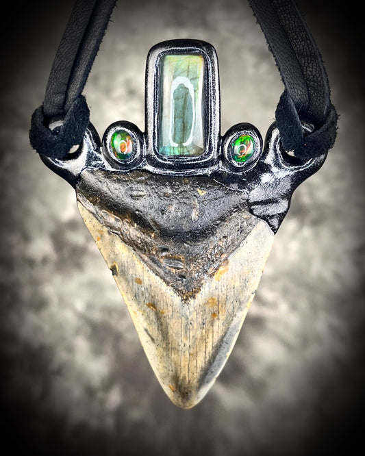 Museum level handmade genuuine Megalodon Fossil and crystal necklace with labradorite and black opals on leather.  Unisex, powerful and one-of-a-kind magical jewelry.  