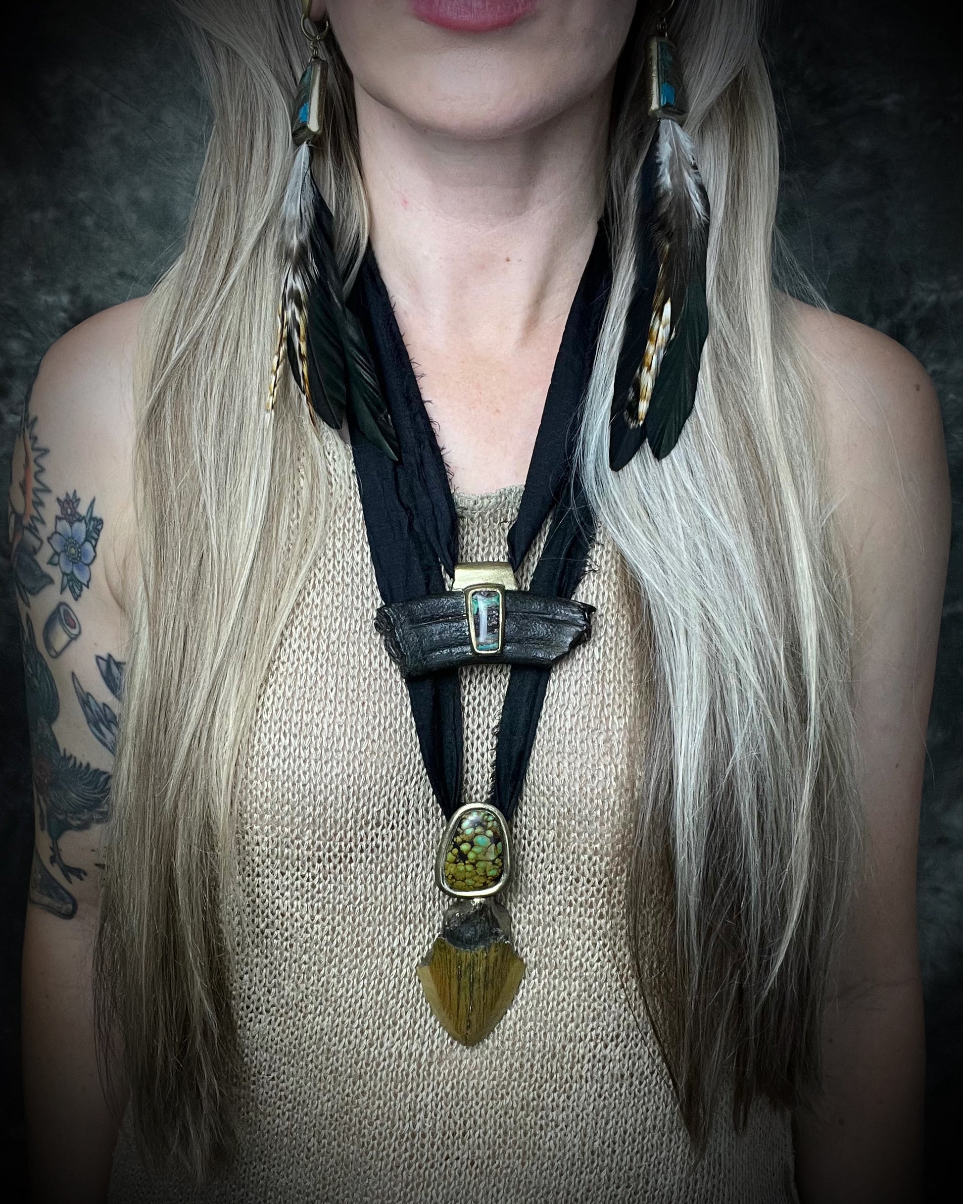 Megalodon fossil tooth talisman with sculptural turquoise in blue, moss green and mustard yellow, gold finish and black recycled silk.