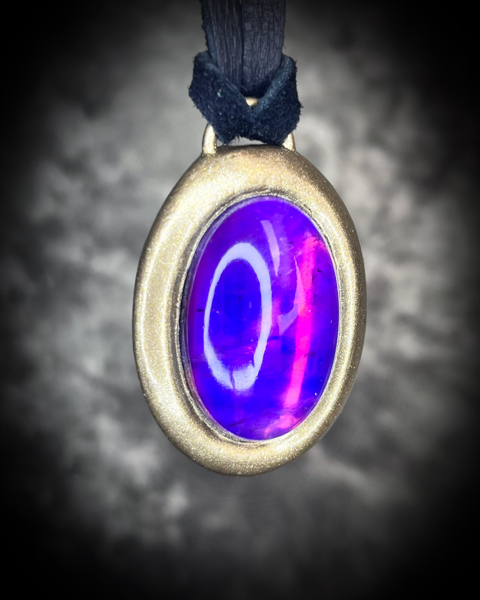 Opalescent amethyst crystal pendant in gold on black leather cord, gothic and mystical statement necklace, birthstone boho jewelry, handmade spiritual talisman.