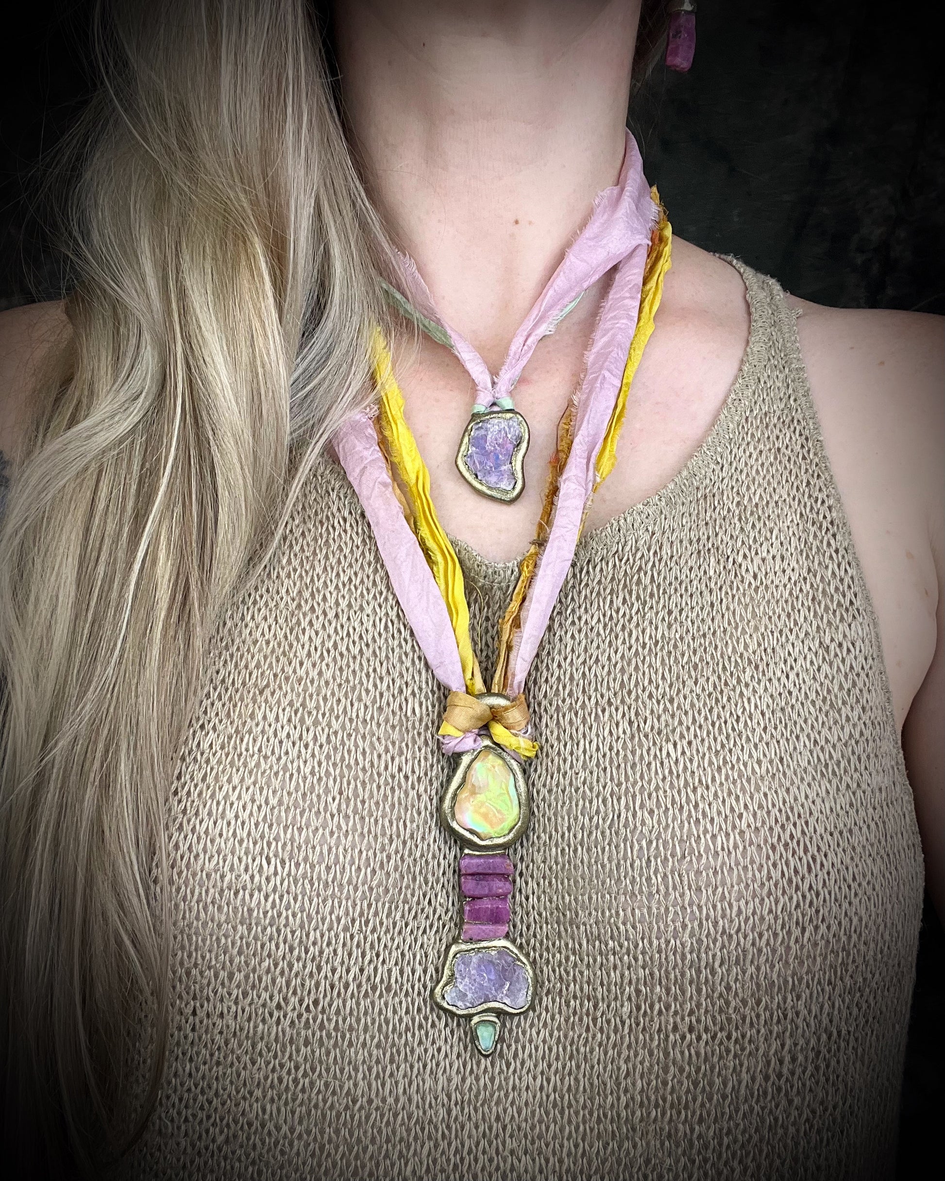 Organic lepidolite crystal talisman  pendant with sculpted gold finish and mint green and lilac recycled silk ties. Handmade by Become Spellbound.