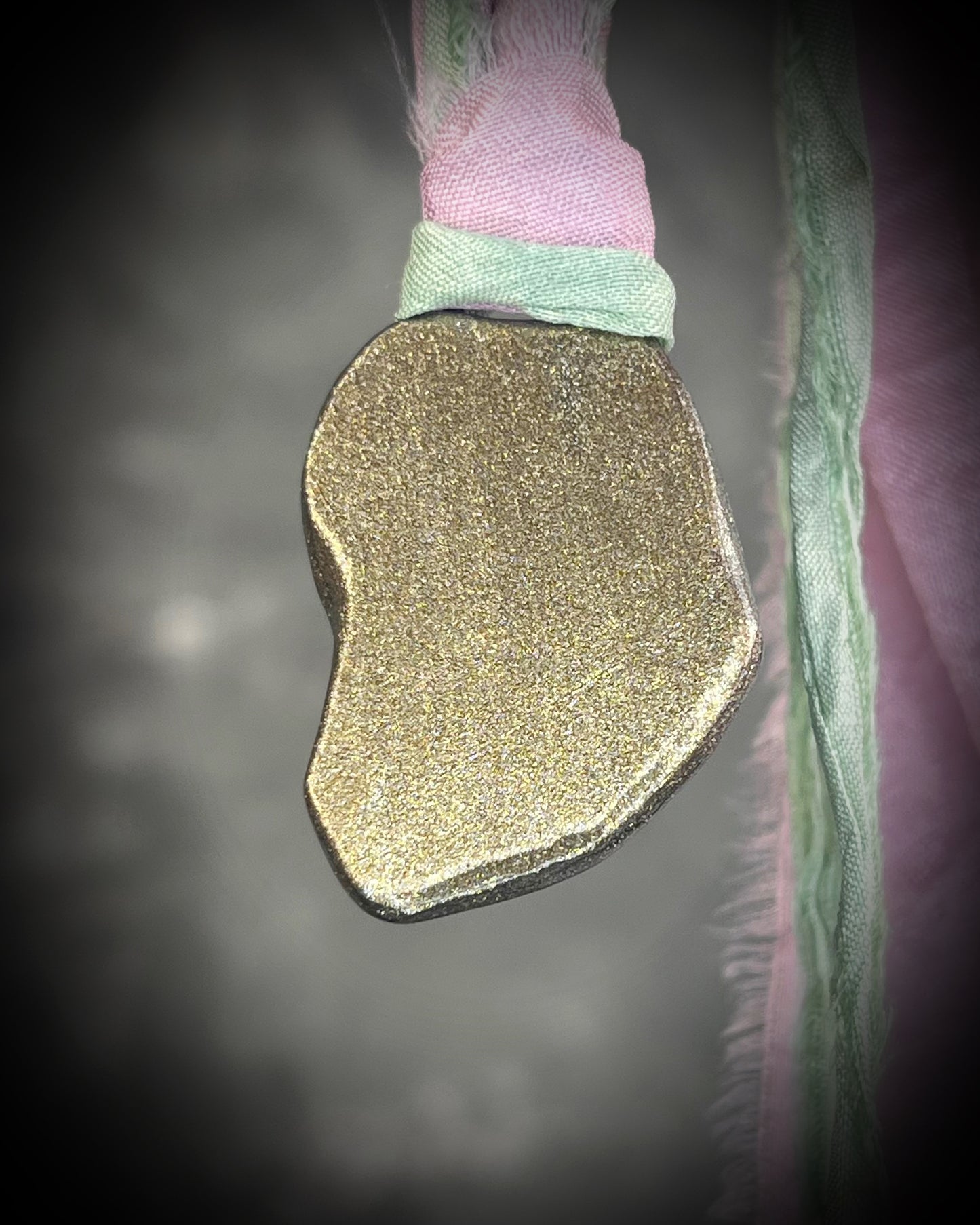 Organic lepidolite crystal talisman  pendant with sculpted gold finish and mint green and lilac recycled silk ties. Handmade by Become Spellbound.