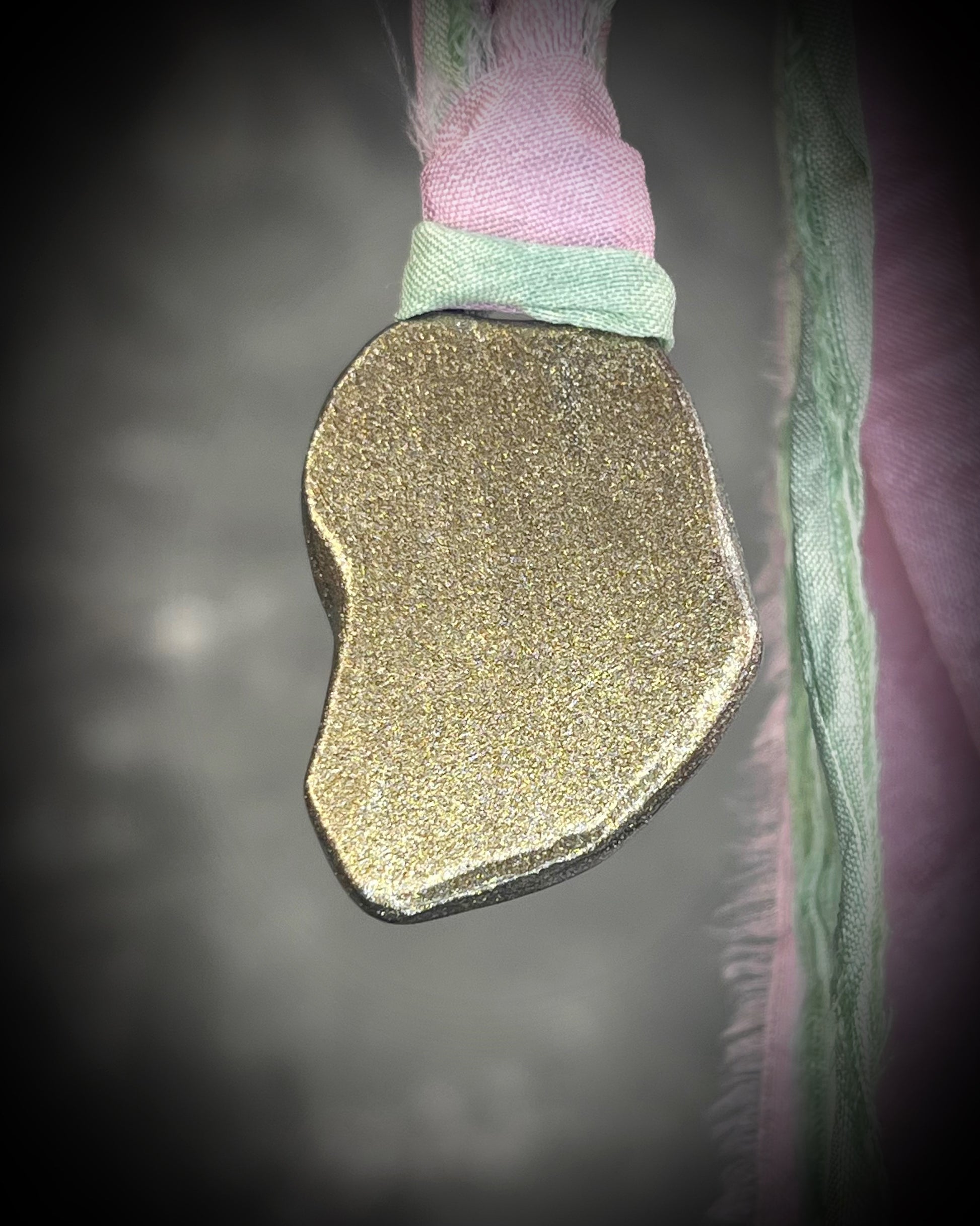 Organic lepidolite crystal talisman  pendant with sculpted gold finish and mint green and lilac recycled silk ties. Handmade by Become Spellbound.