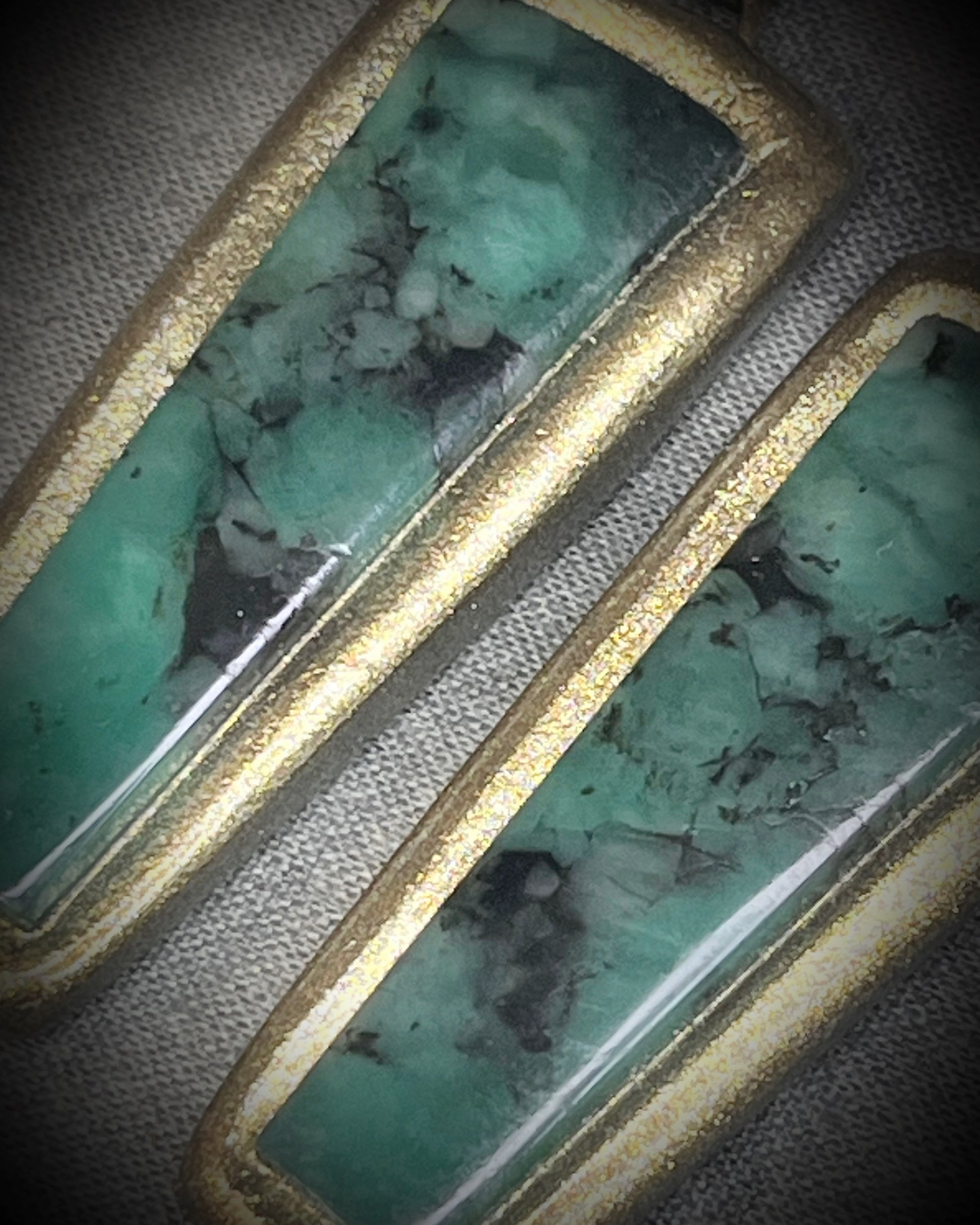 Oversized Emerald gemstone earrings in gold finish with hypoallergenic brass huggie hooks, green crystal statement jewelry handmade in Baltimore Maryland.