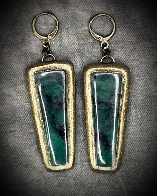 Oversized Emerald gemstone earrings in gold finish with hypoallergenic brass huggie hooks, green crystal statement jewelry handmade in Baltimore Maryland. Front view.