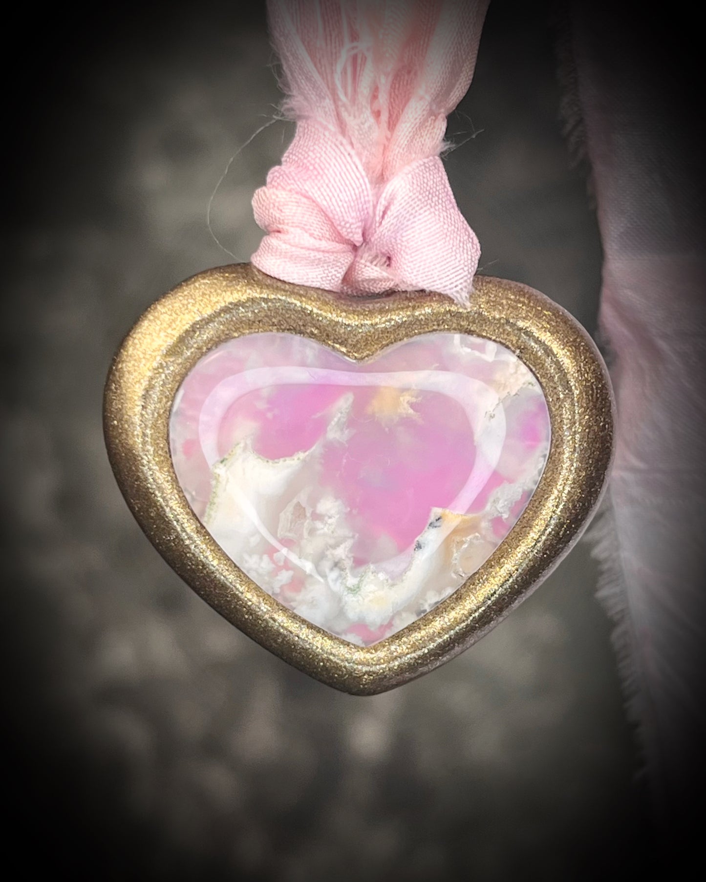 Pink Plume Agate Heart Shaped Crystal Necklace on soft pink recycled silks. Handmade by Baltimore Magazine's Best of Baltimore Jewelry Winner for 2026: Become Spellbound.