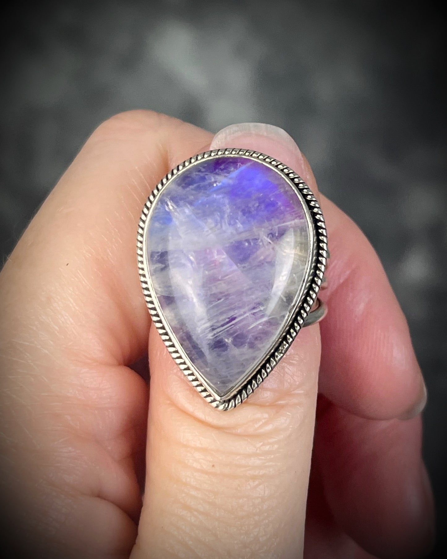 Pink moonstone sterling silver ring with luminous magenta tones and iridescent flash, celestial gemstone jewelry