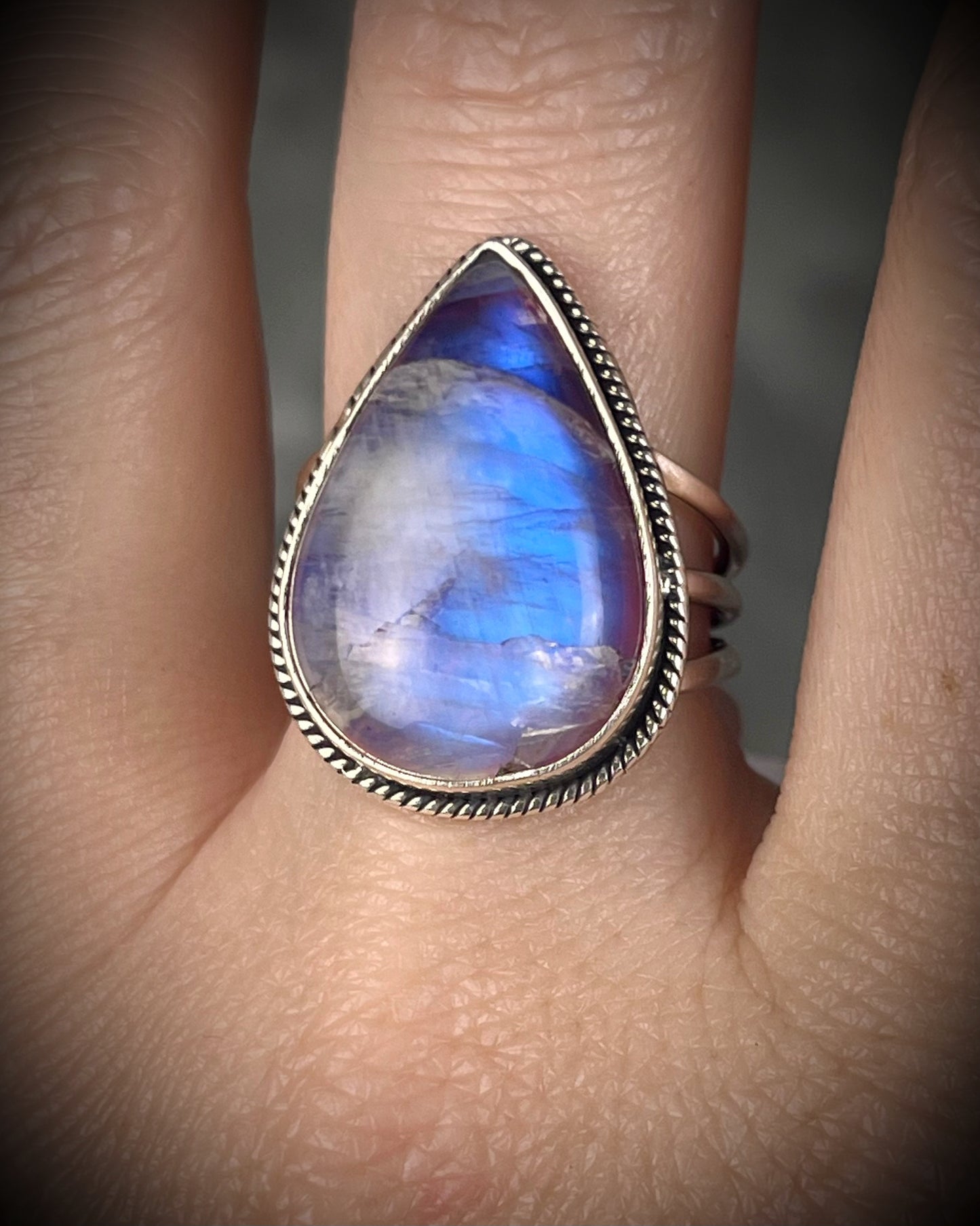 Pink moonstone sterling silver ring with luminous magenta tones and iridescent flash, celestial gemstone jewelry