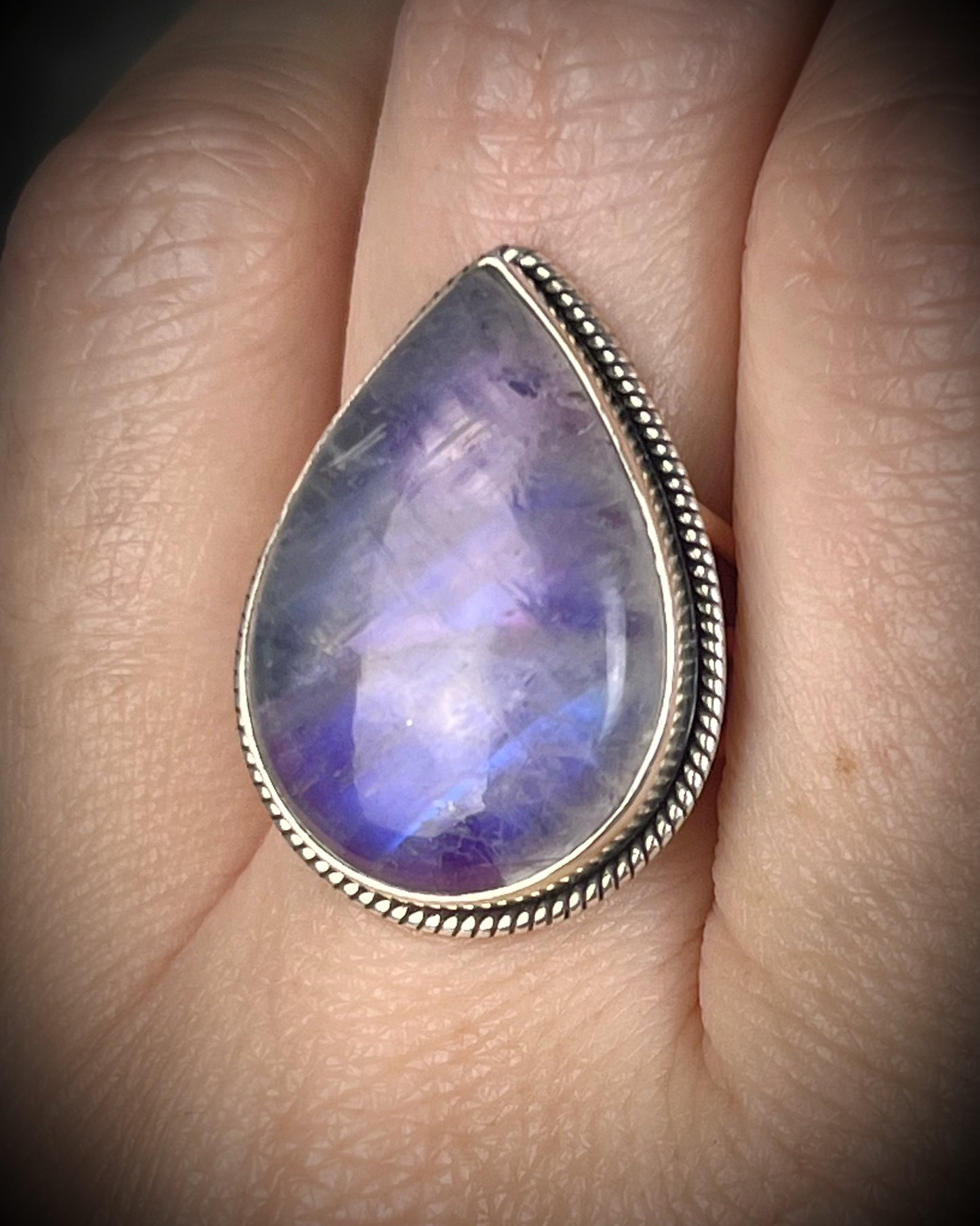 Pink moonstone sterling silver ring with luminous magenta tones and iridescent flash, celestial gemstone jewelry, teardrop shaped ring. 