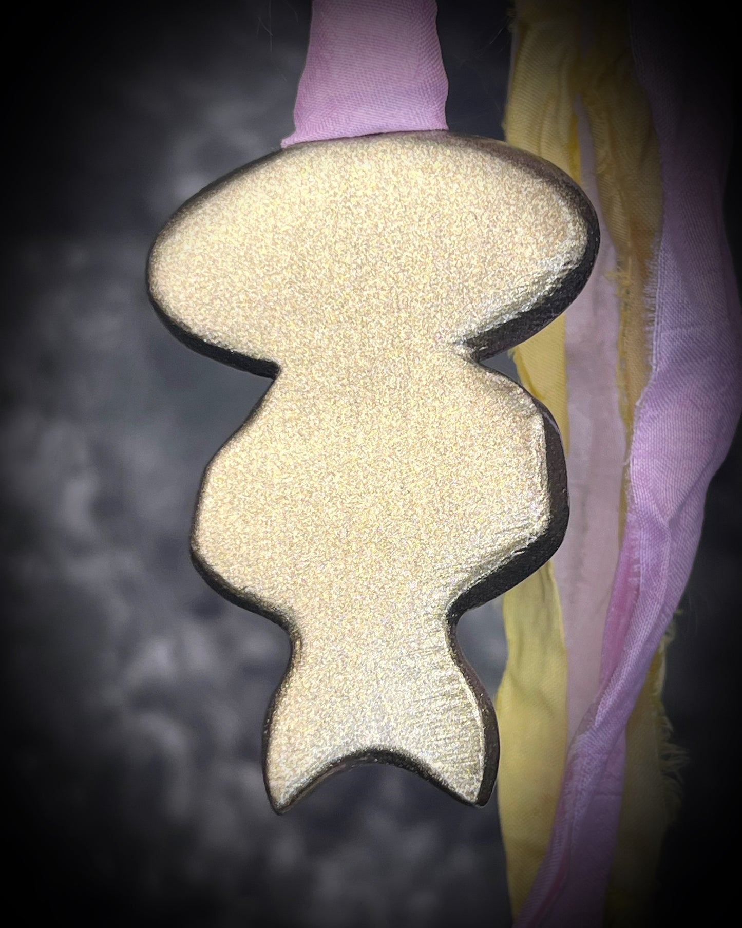 Pink plume agate talisman with Libyan Desert Glass and labradorite moon on pink and yellow recycled silk ties, hand sculpted by Become Spellbound, Baltimore Magazine Best of Baltimore 2026 Jewelry winner.