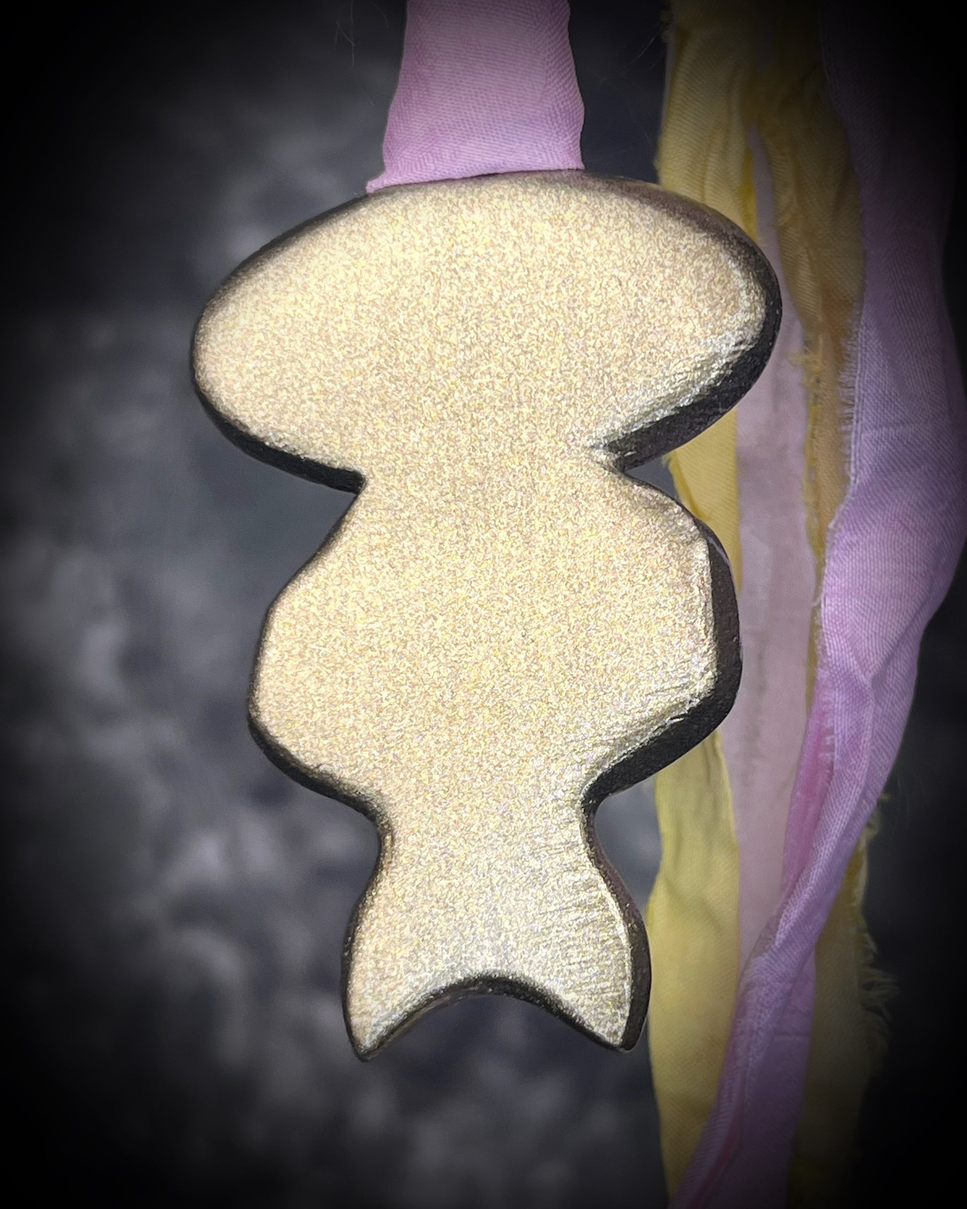 Pink plume agate talisman with Libyan Desert Glass and labradorite moon on pink and yellow recycled silk ties, hand sculpted by Become Spellbound, Baltimore Magazine Best of Baltimore 2026 Jewelry winner.